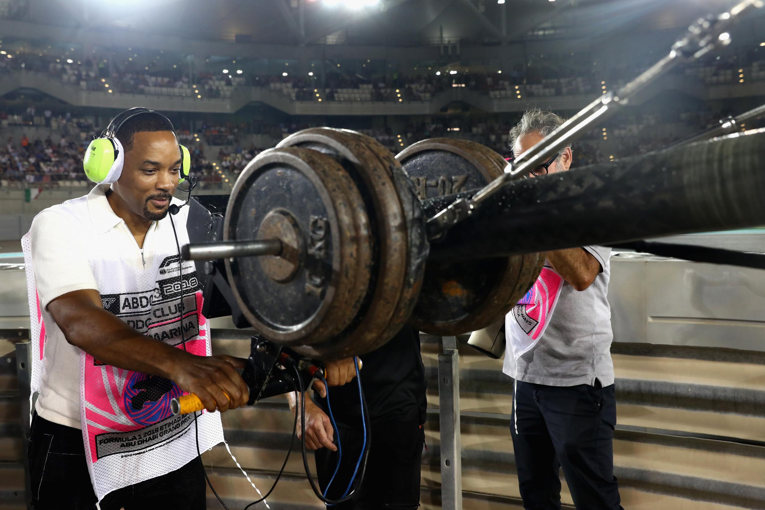 Will Smith tries his hand as a camera man during the race