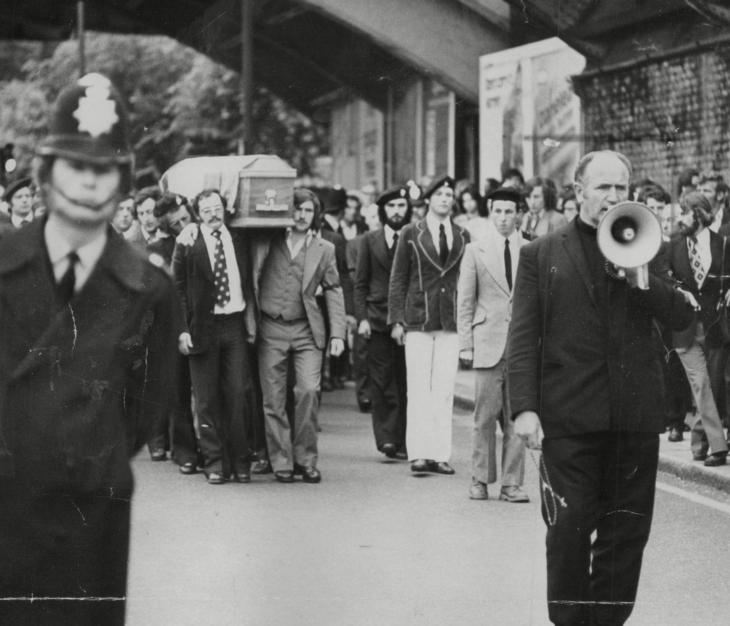 Protesters march through Kilburn in north London in 1974 with the coffin of Michael Gaughan, a member of the IRA who died during a hunger strike in Parkhurst Prison