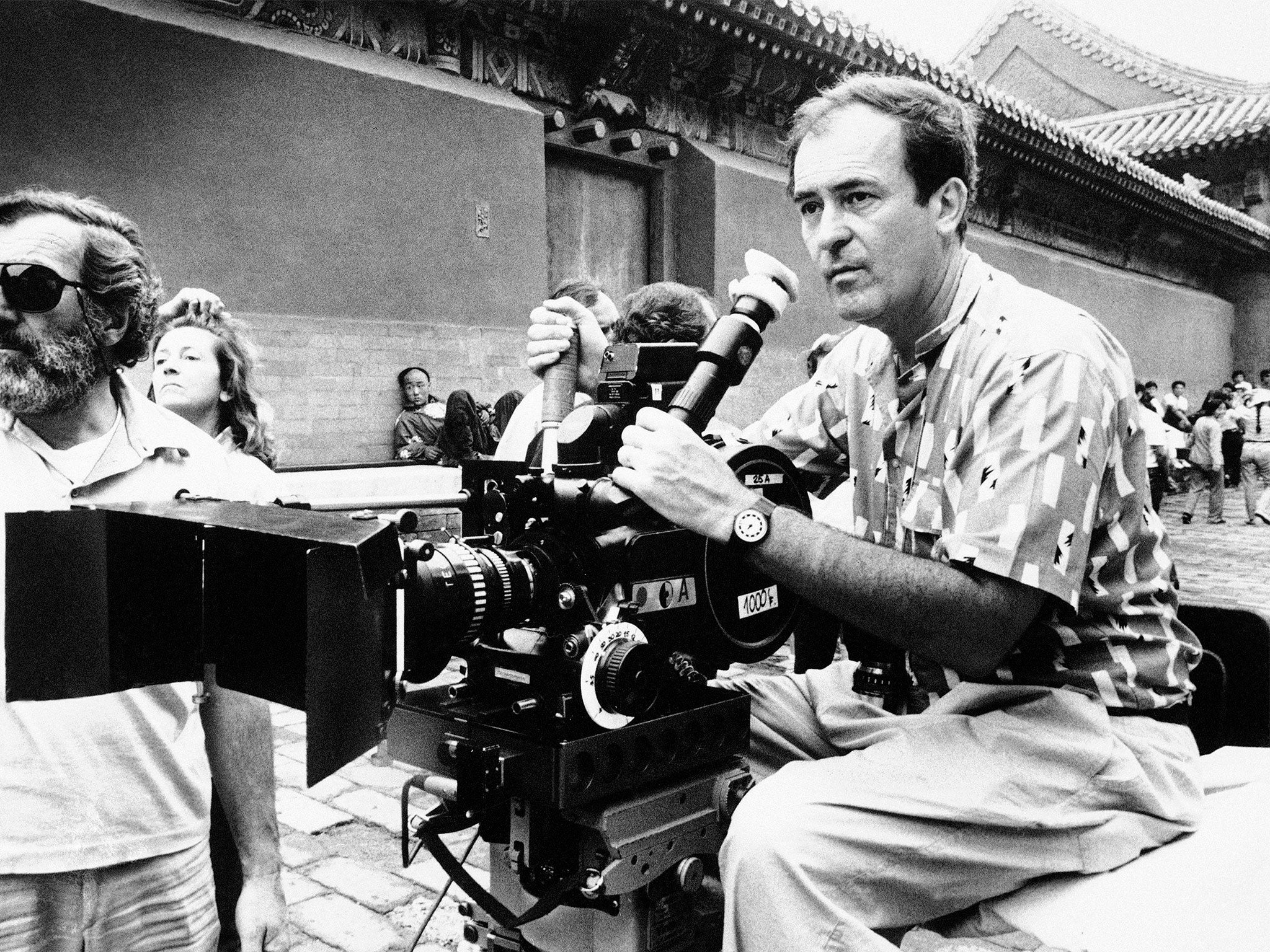 Bertolucci on the set of ‘The Last Emperor’ in 1987