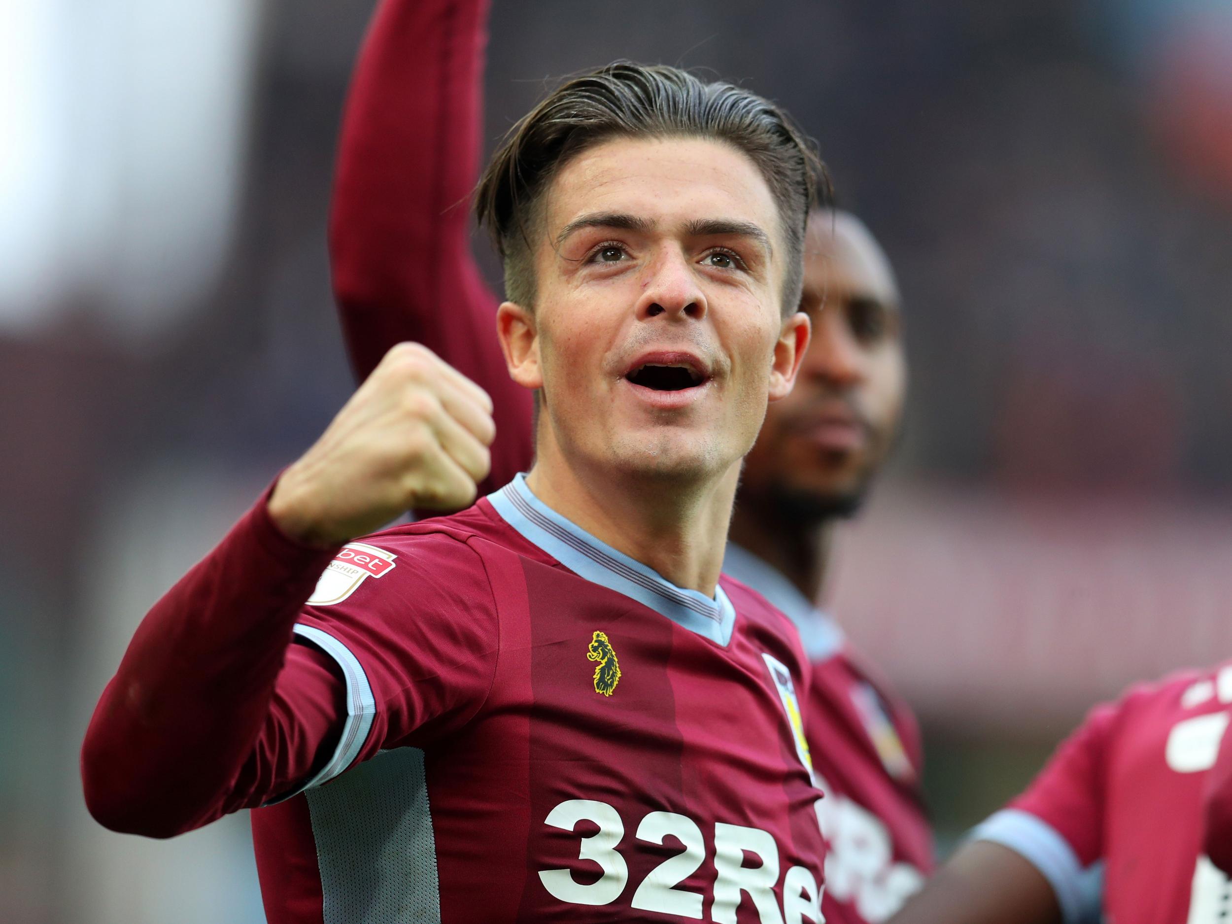 Jack Grealish celebrates after scoring against Birmingham in the second-city derby