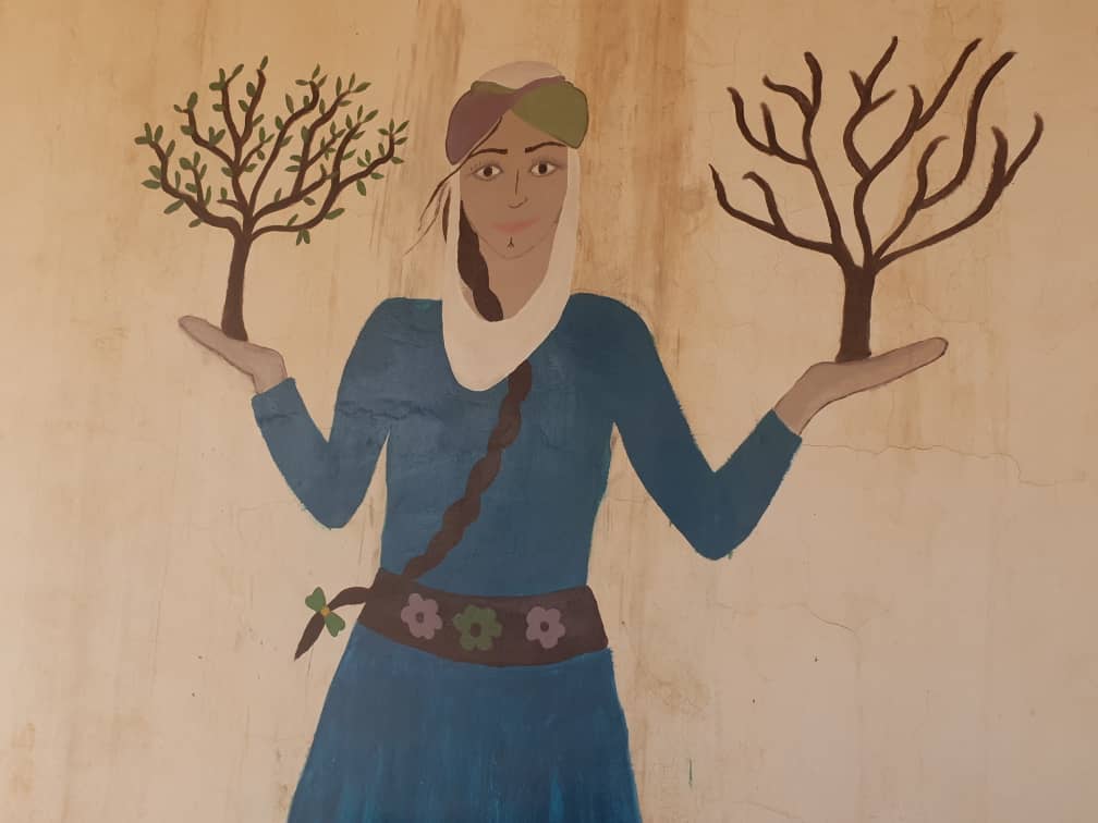 A mural in Jinwar