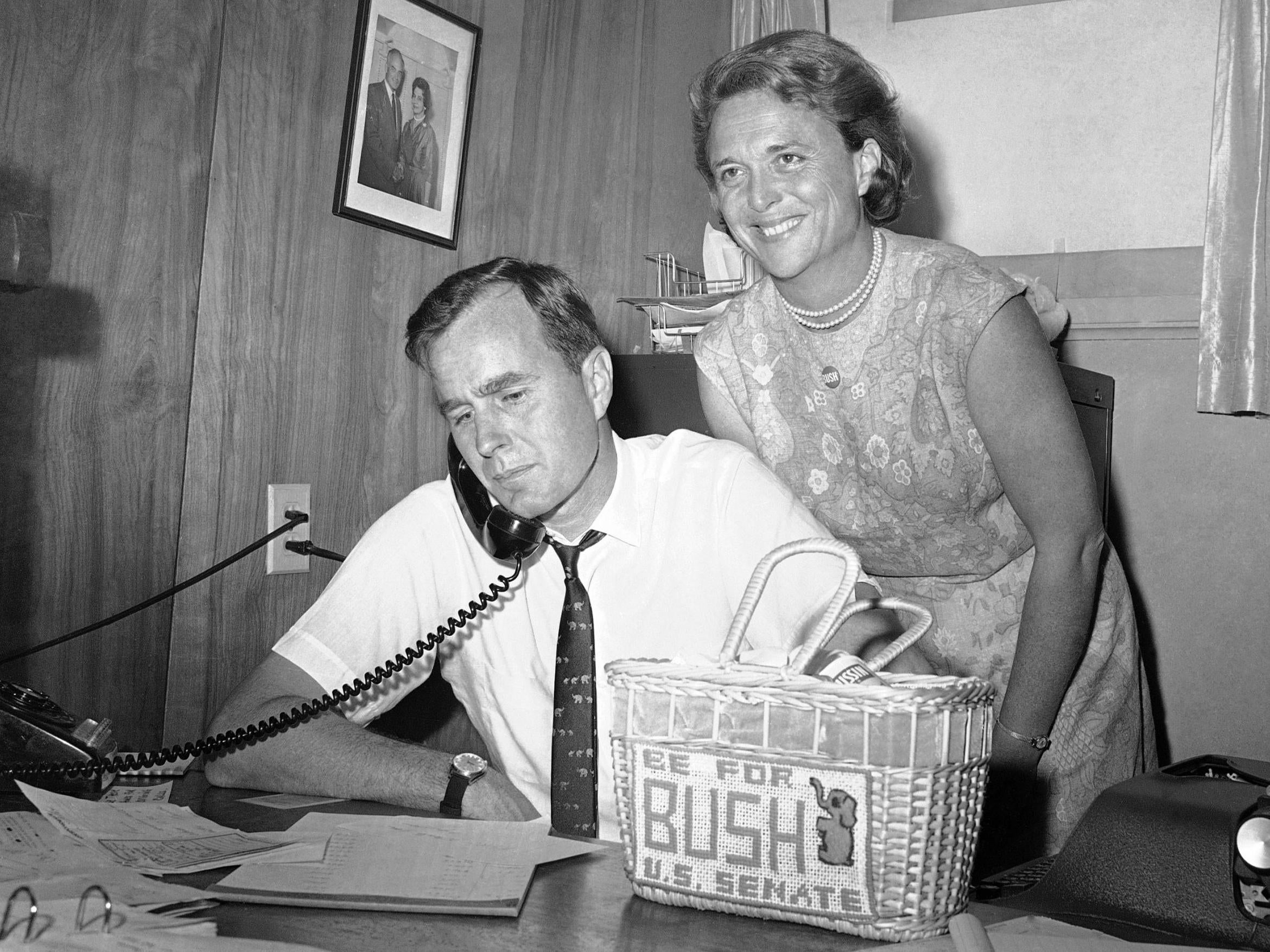 George HW Bush and his wife, Barbara, at his Senate election campaign headquarters on 6 June 1964