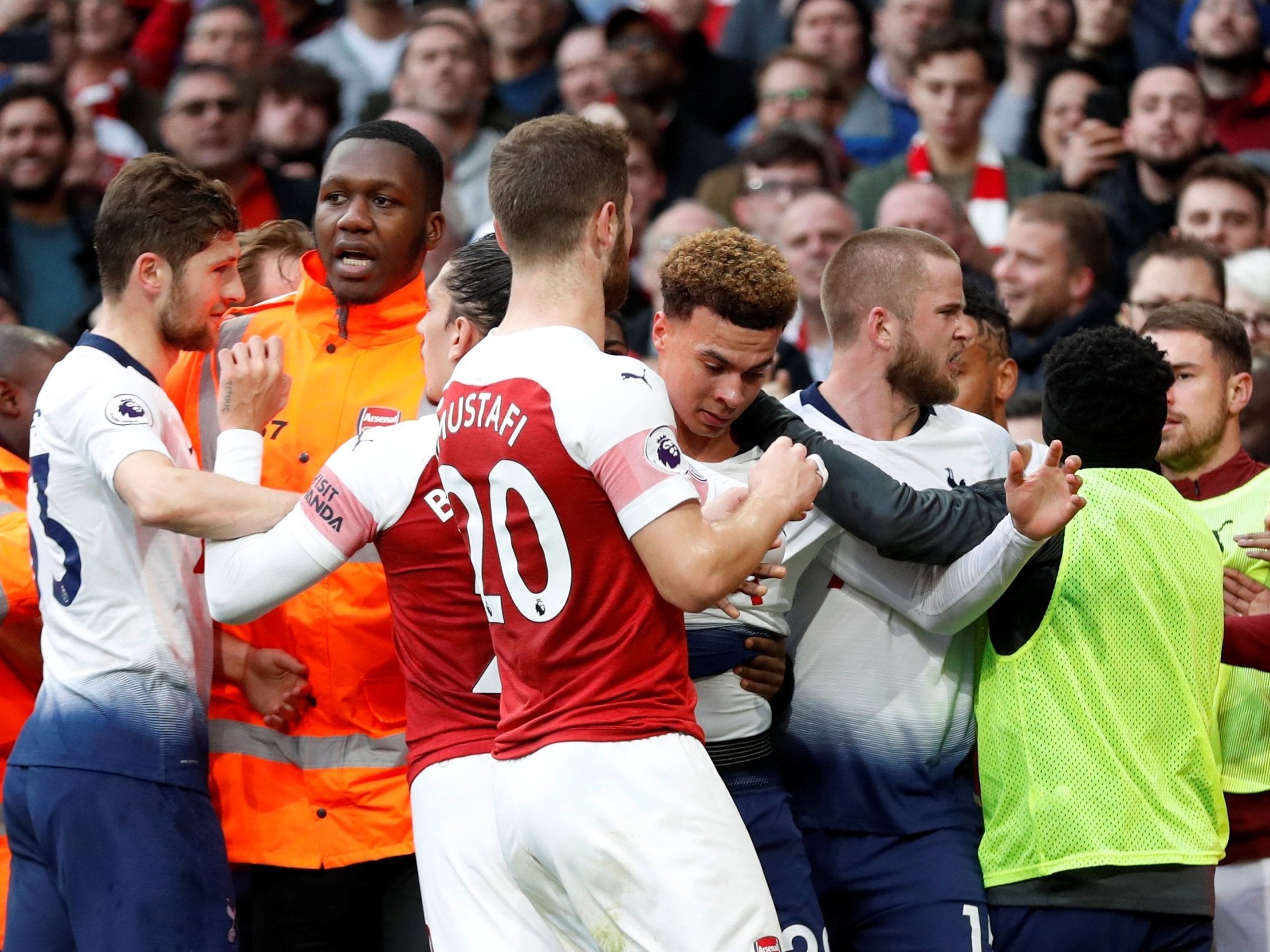 Arsenal and Tottenham players come to blows