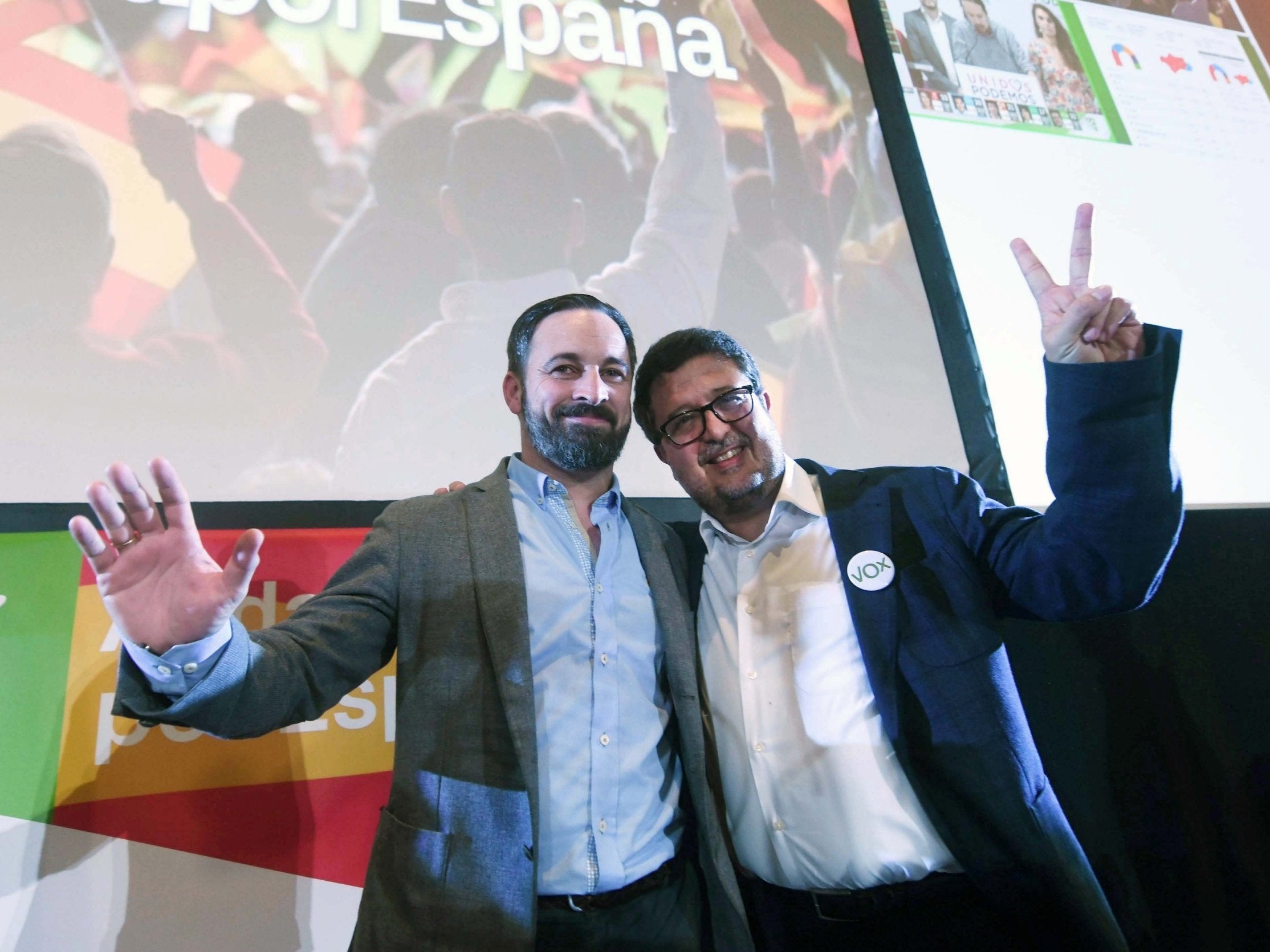 Vox's leader Santiago Abascal (left) and regional candidate Francisco Serrano (right)