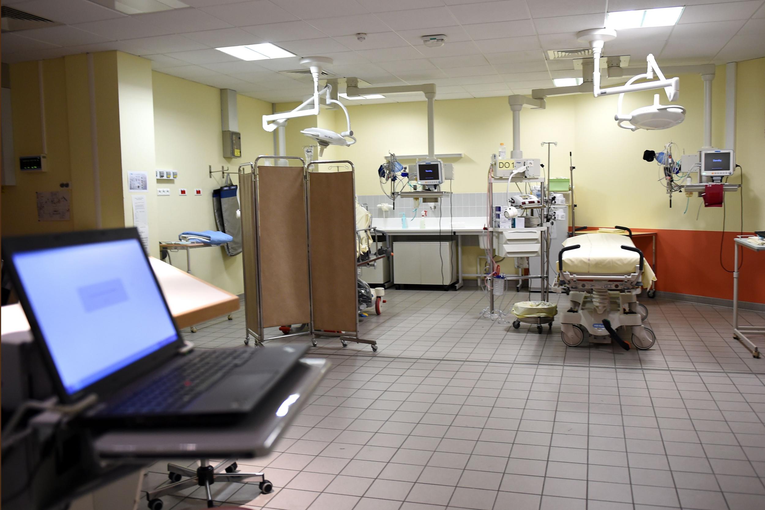 ‘The red smears across the floor are mopped away, ready for the next patient’