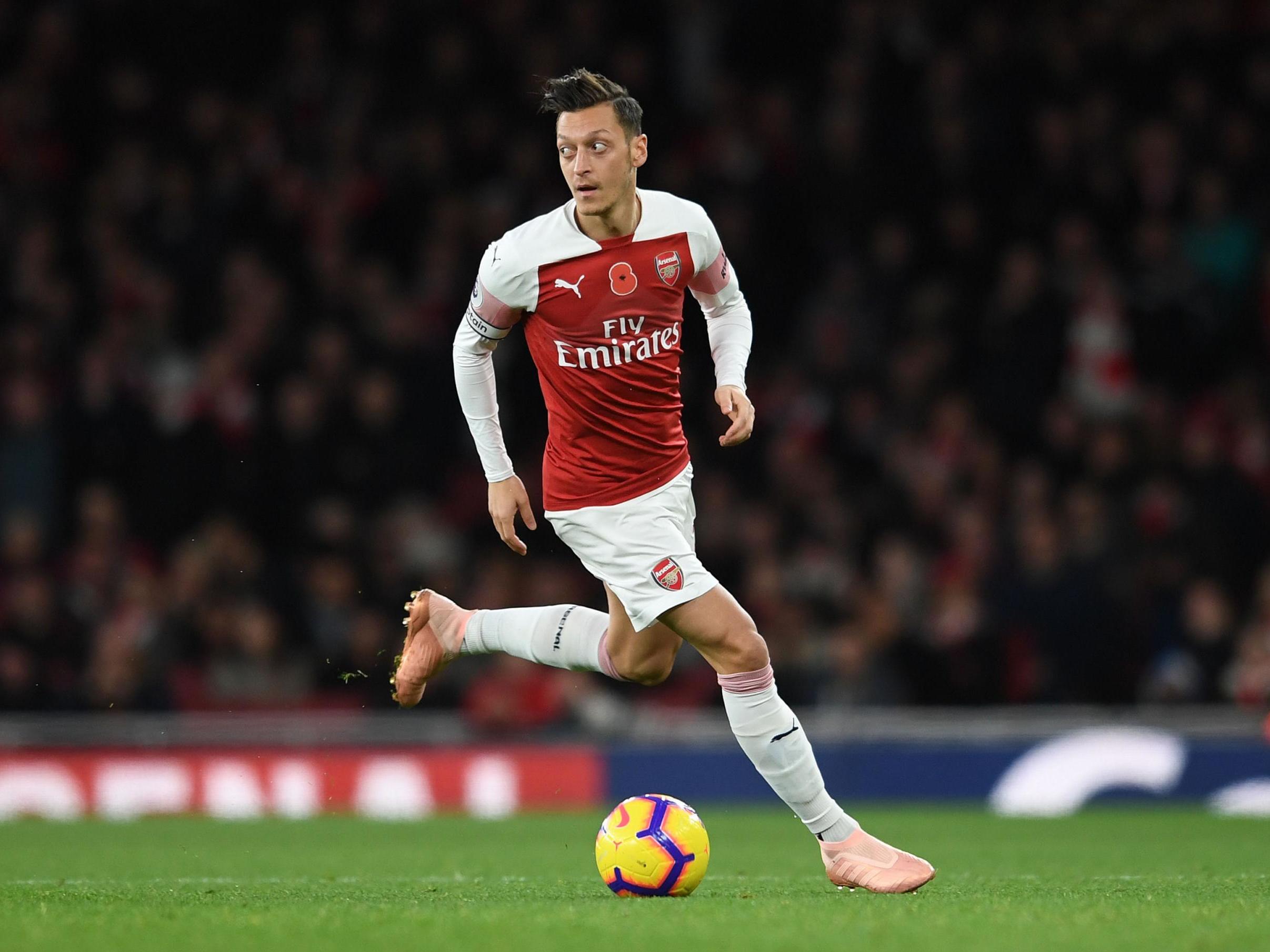 Ian Wright believes that Mesut Ozil isn't justifying his expensive wages at Arsenal