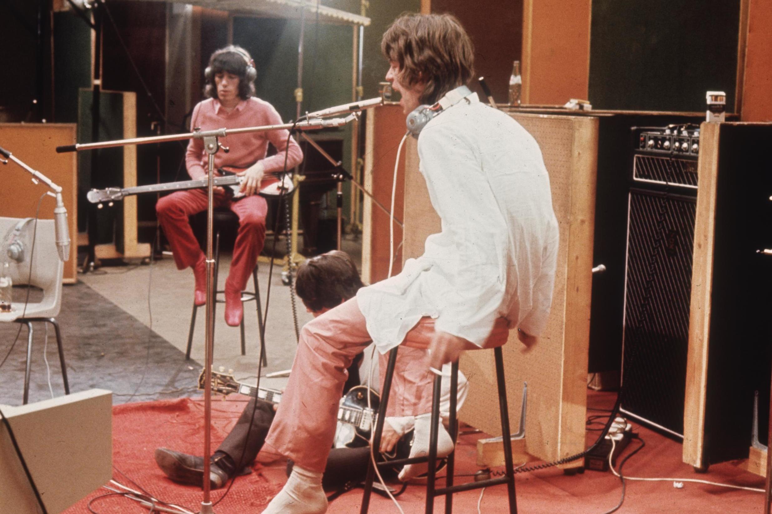 Mick Jagger recording the vocals for ‘Sympathy for the Devil’ in 1968 (Getty)