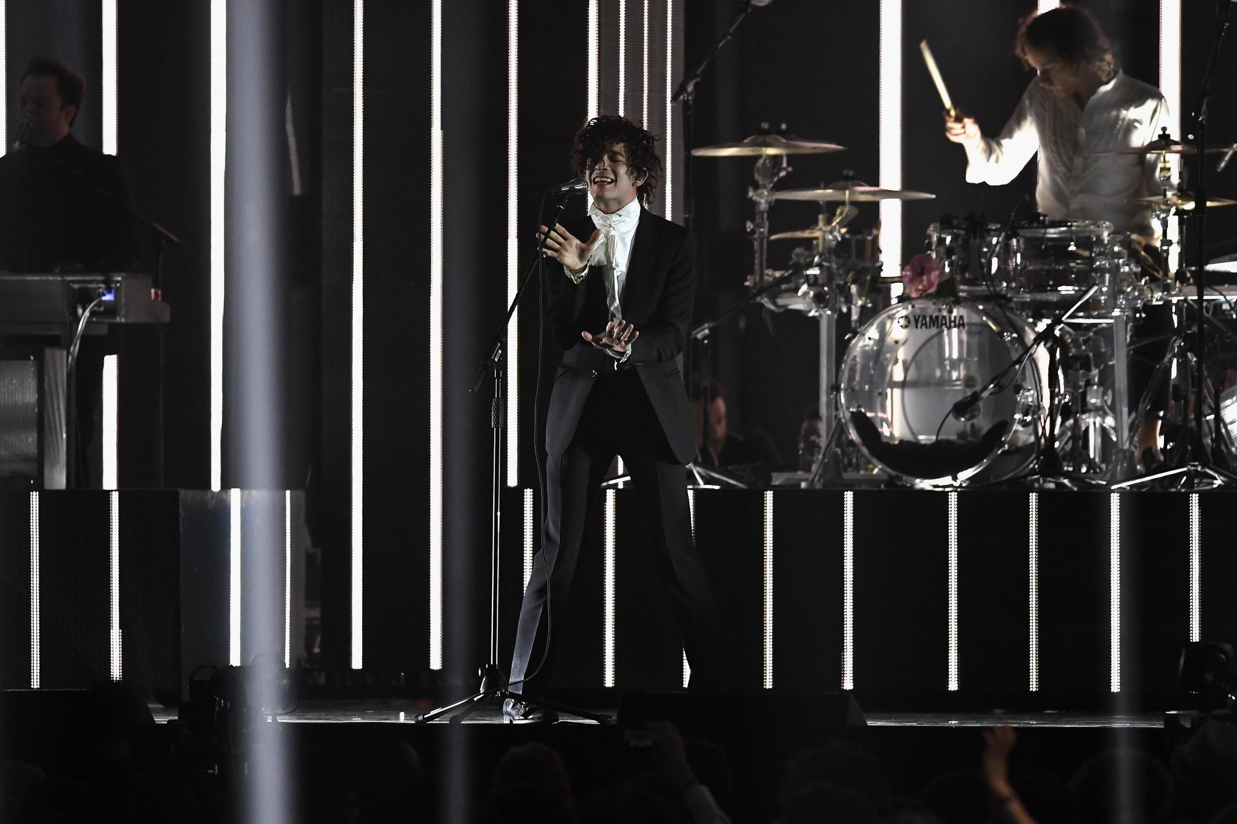 Matthew Healy performs with The 1975 on stage at The BRIT Awards 2017 at The O2 Arena on 22 February, 2017 in London, England.