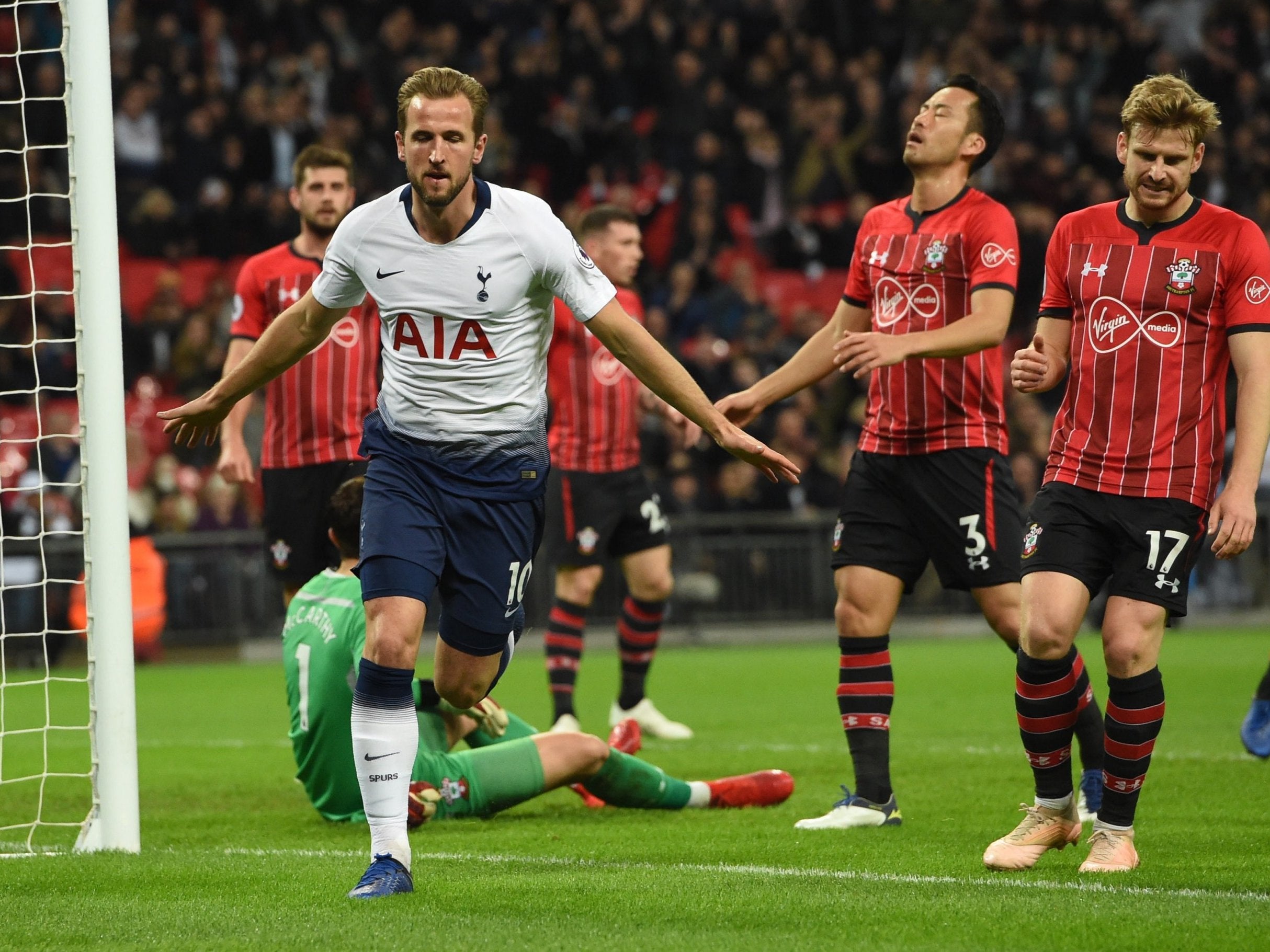 Harry Kane celebrates scoring in the first half