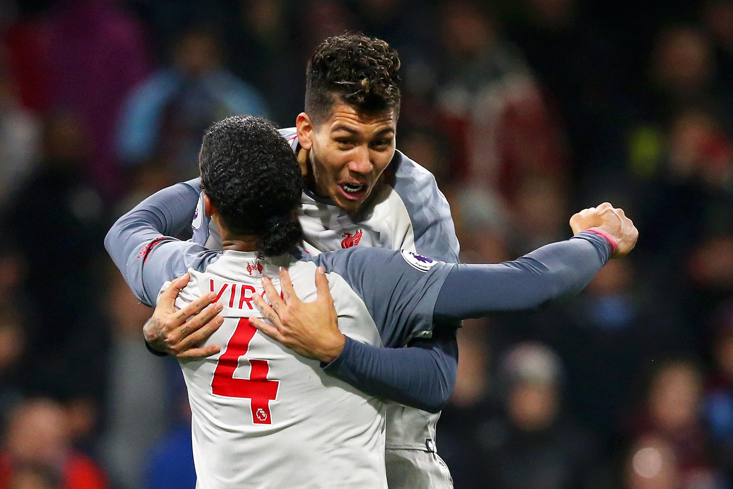 Van Dijk and Firmino celebrate Liverpool's winner