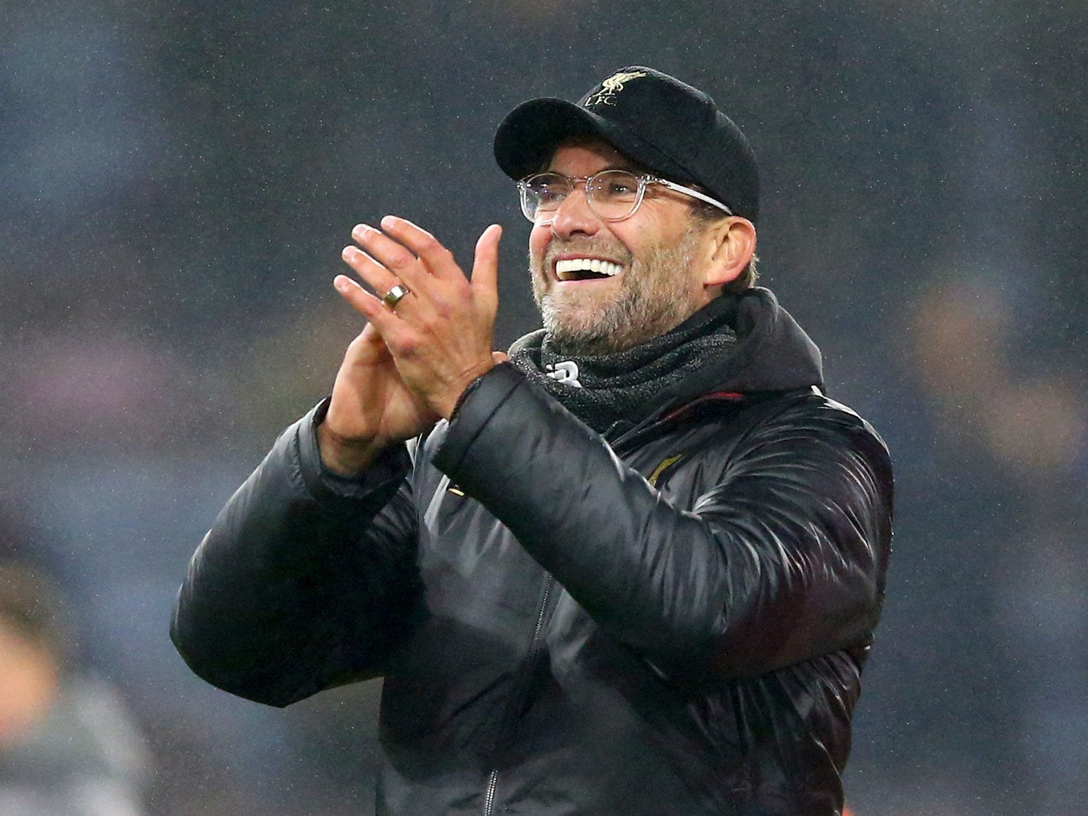 Jurgen Klopp applauds the Liverpool fans at full-time