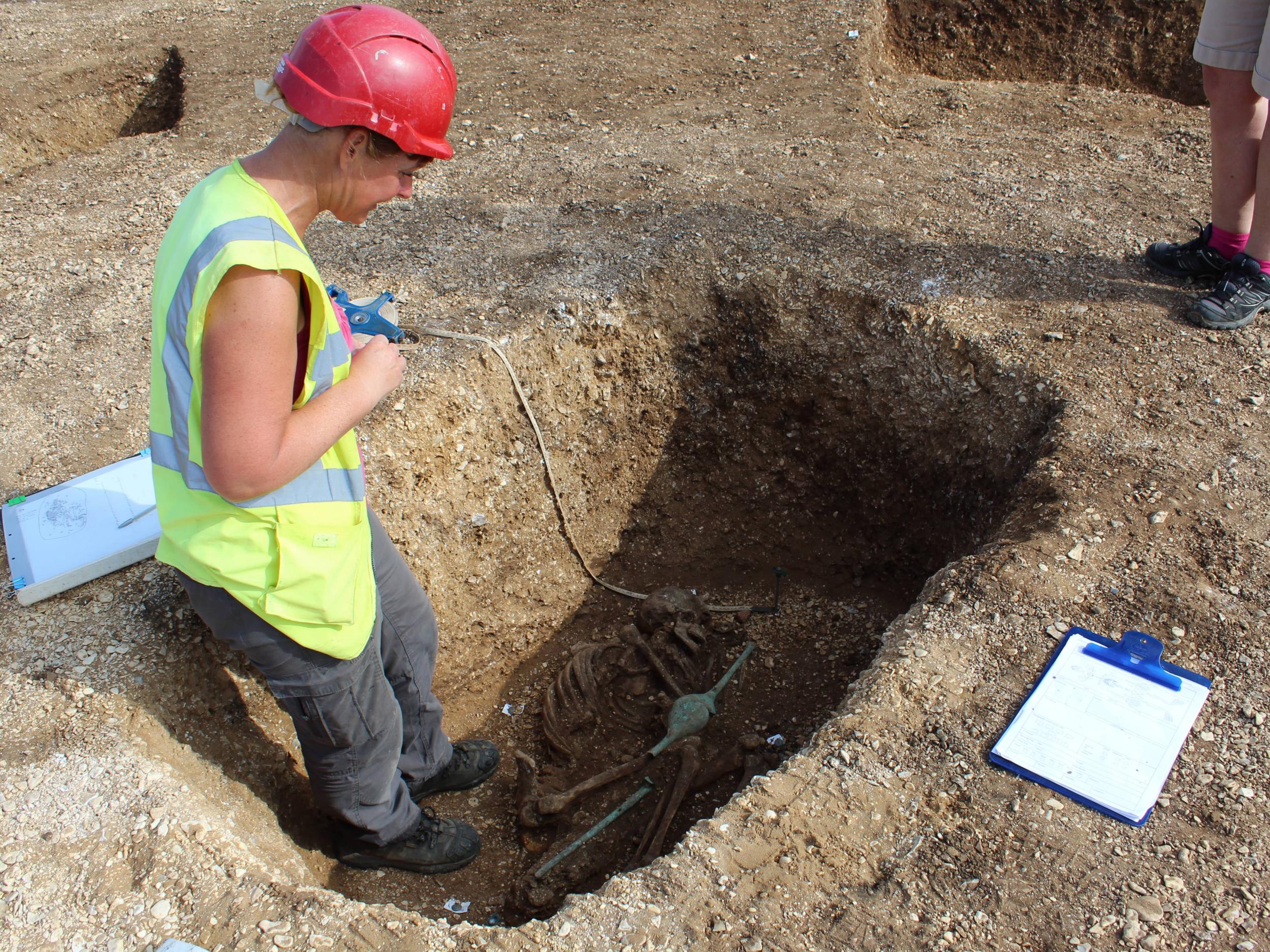 The excavation of the remains of a speared Iron Age man near Pocklington, Yorkshire