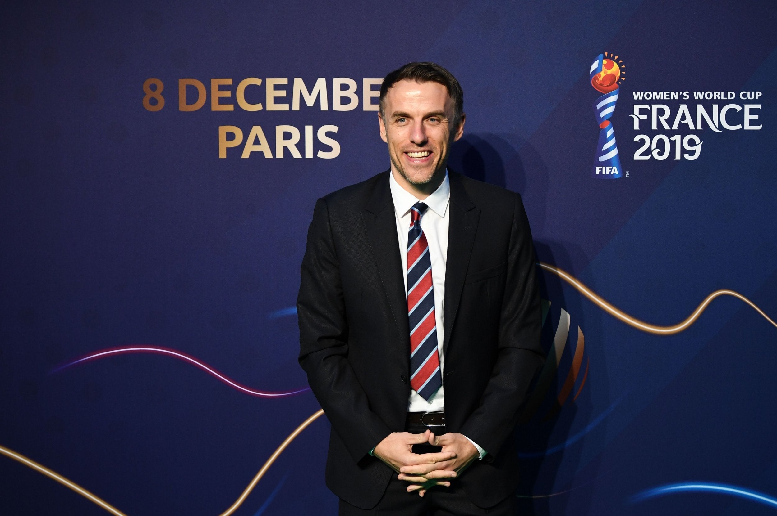 Phil Neville is in Paris for the draw