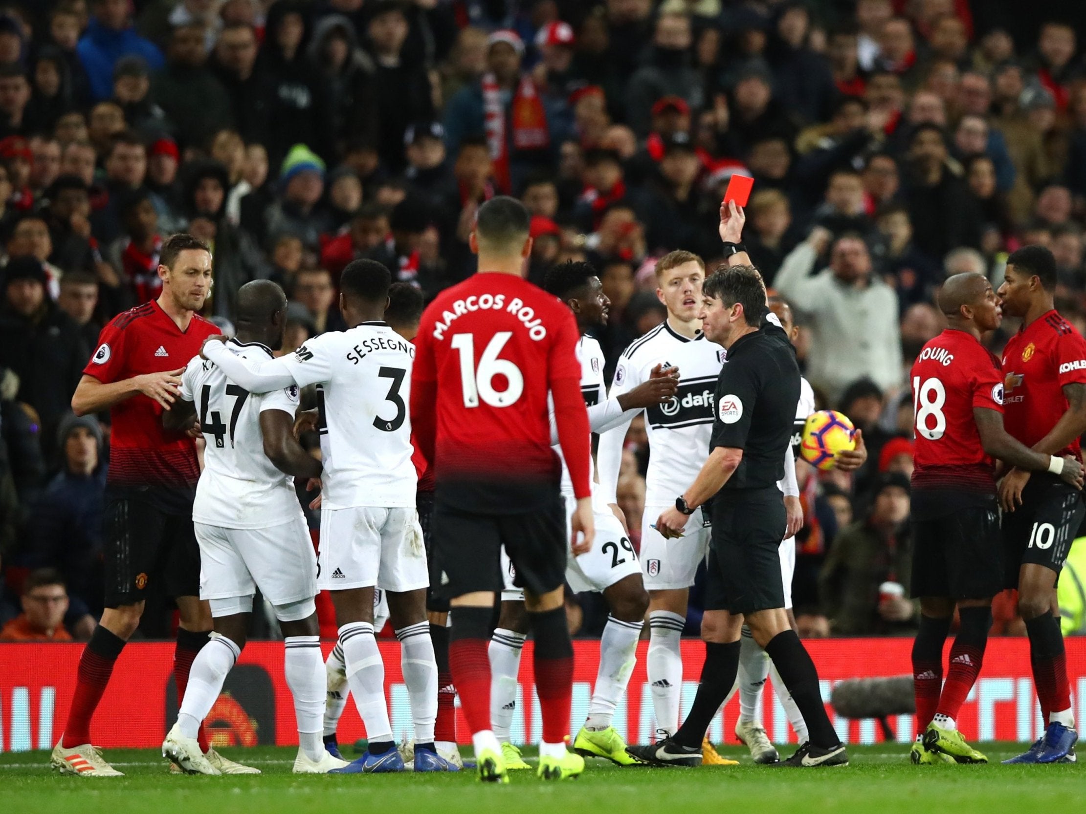 Franck Zambo Anguissa is shown a red card for Fulham