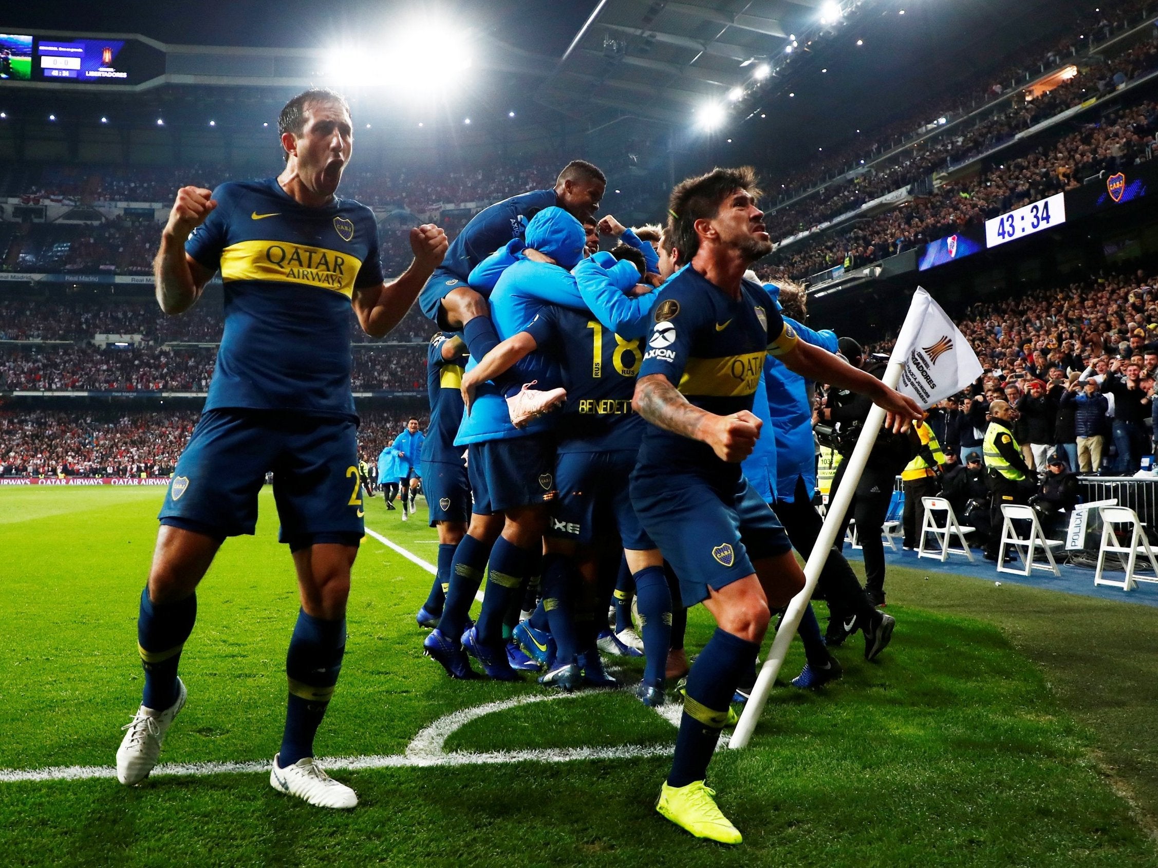 Boca Juniors players celebrate Dario Benedetto’s opening goal