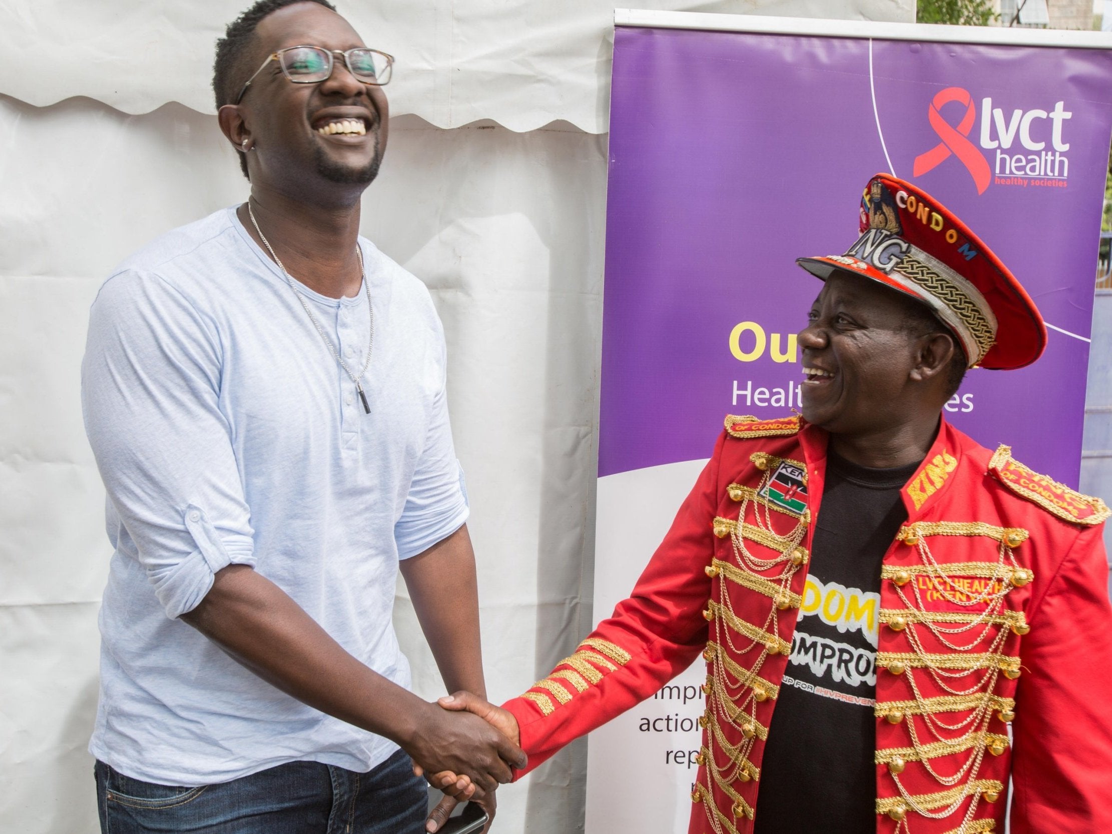 Kenyan pop star Tetu Shani, left, with ‘King of Condoms’, Stanley Ngara