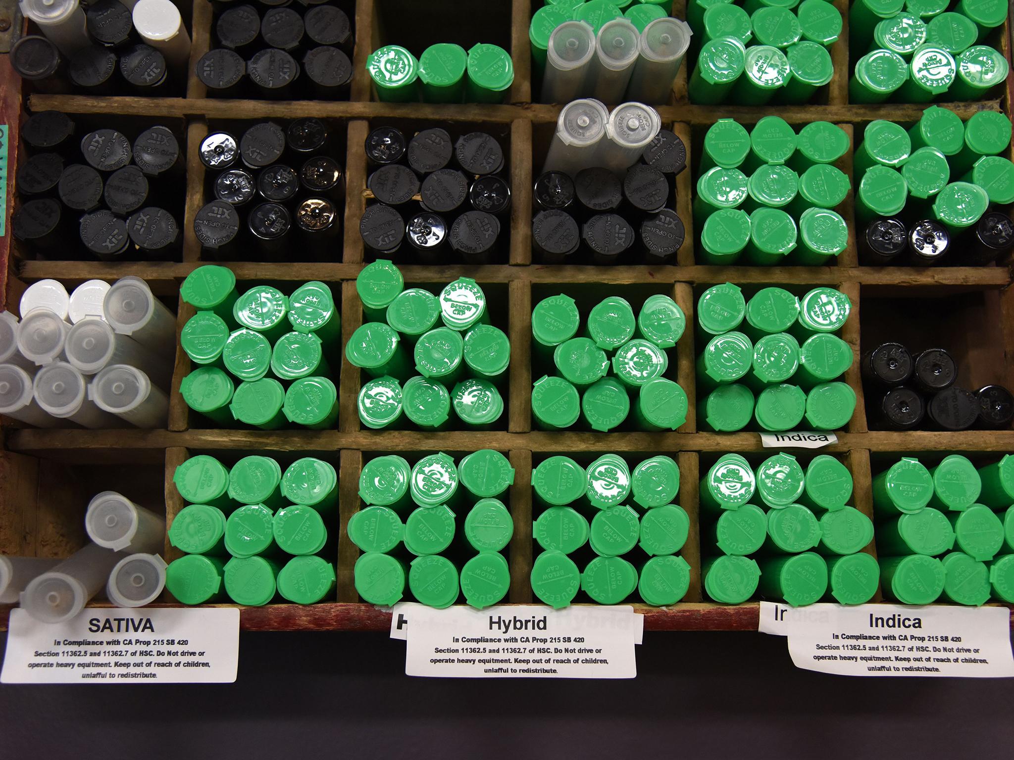 Pre-rolled marijuana cigarettes are seen for sale at the Green Pearl Organics dispensary on the first day of legal recreational marijuana sales in California, January 1 2018 (AFP/Getty)