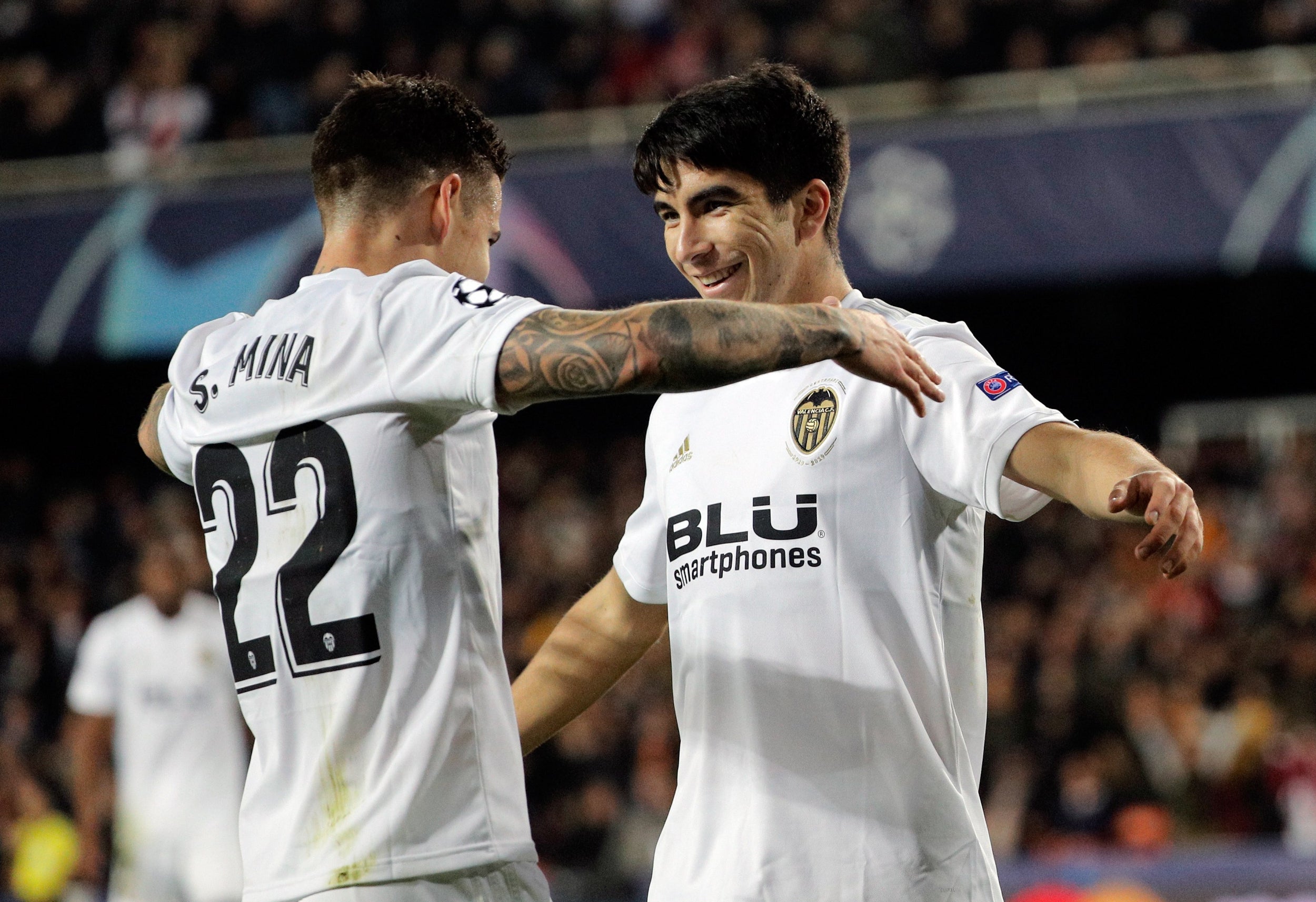 Carlos Soler, right, celebrates scoring Valencia's opener