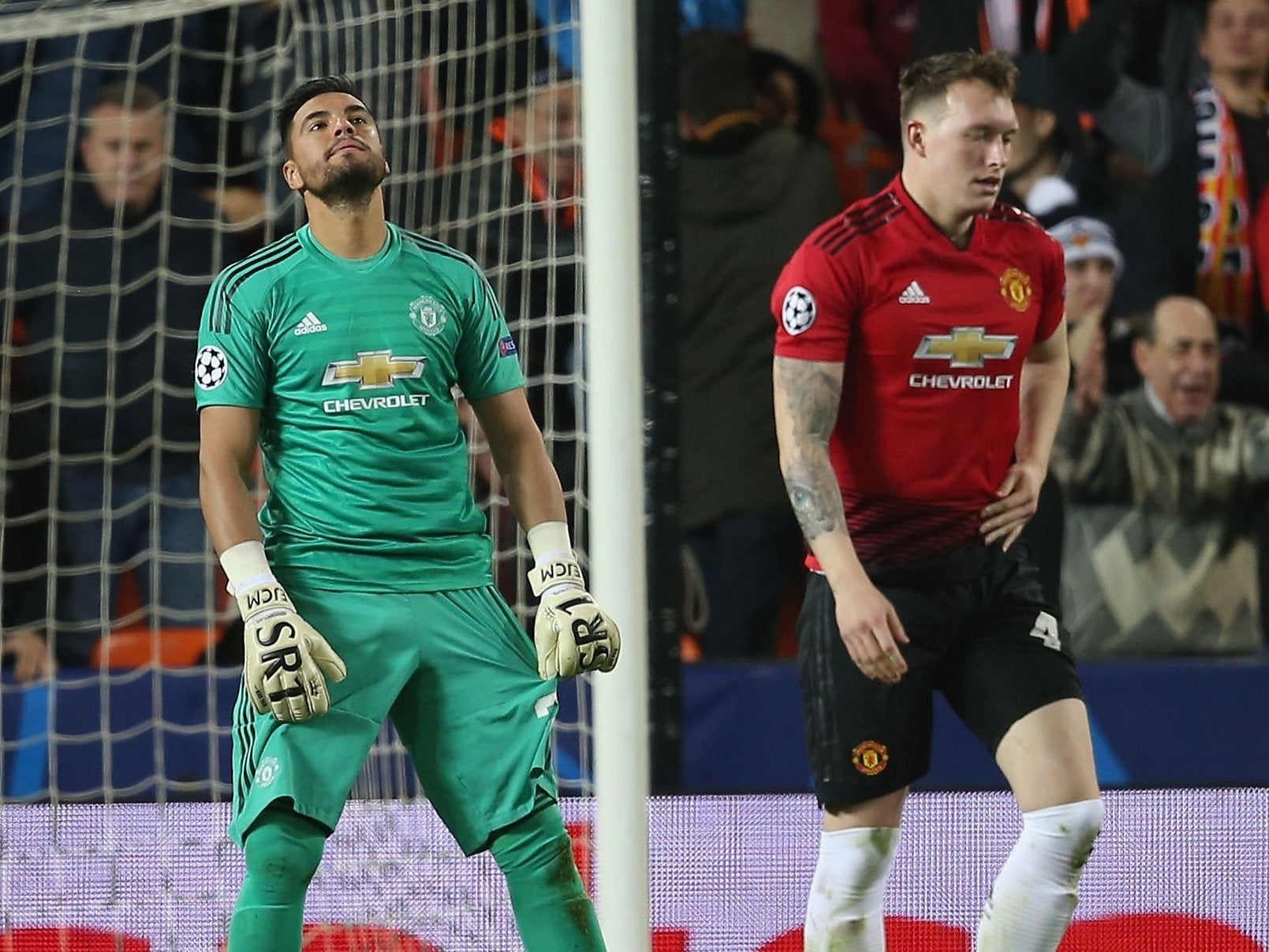 Phil Jones reacts after putting the ball past his own goalkeeper Sergio Ramos