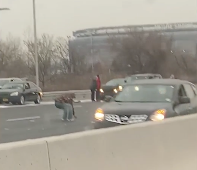 Social media footage shows people stepping out of their vehicles in ongoing traffic.