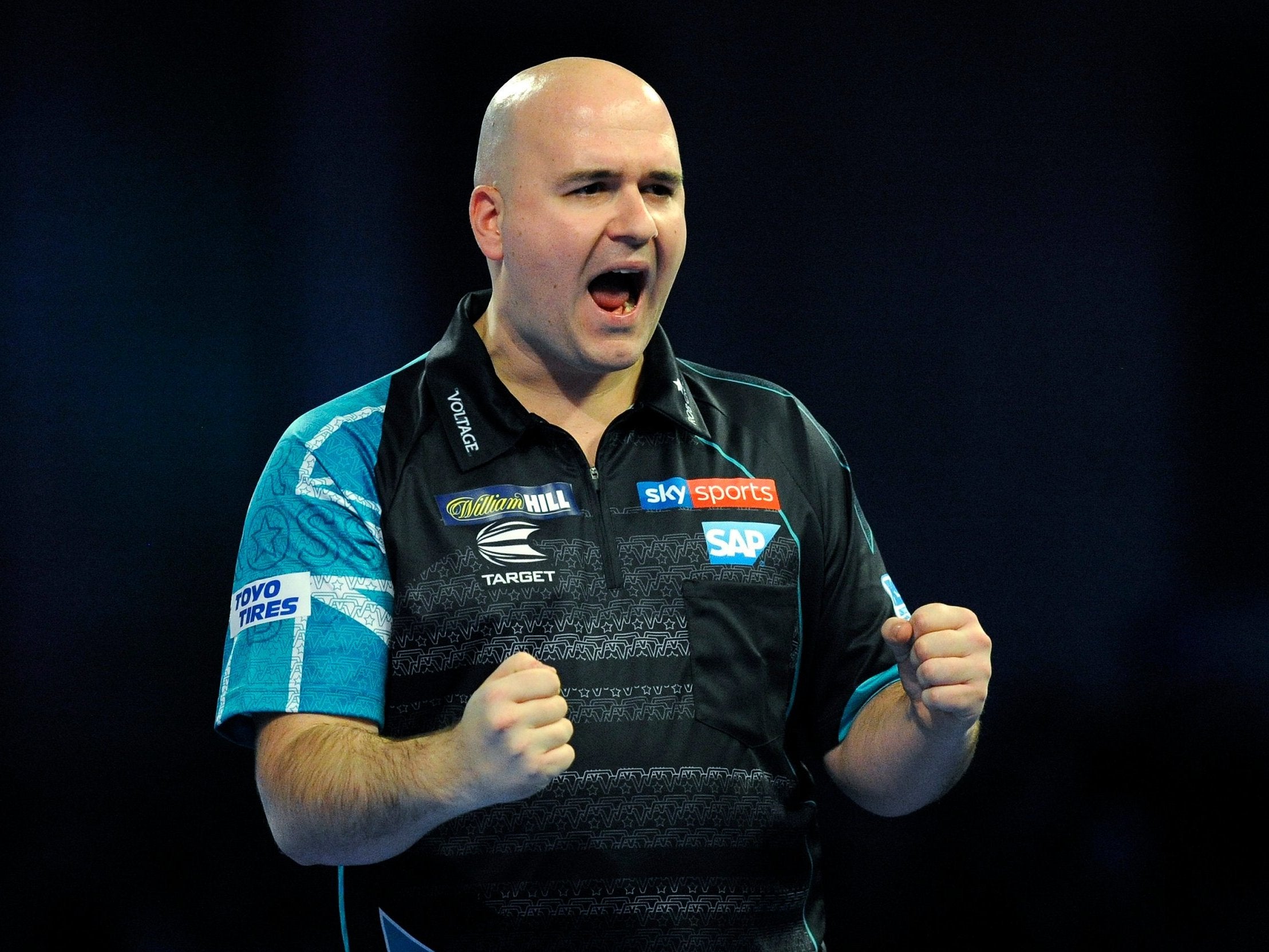 Rob Cross celebrates his victory over Jeffrey de Zwaan