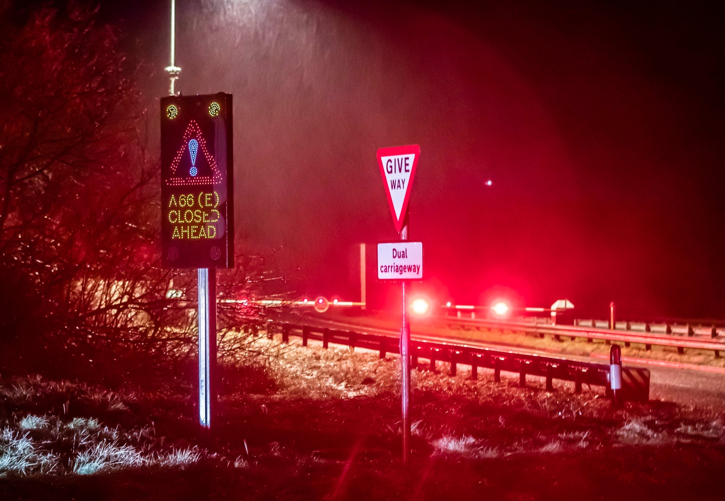 The A66 near Brough in Cumbria is closed due to "adverse cold weather creating dangerous road conditions" as heavy snow, gales and "rare" freezing rain sweep parts of the country