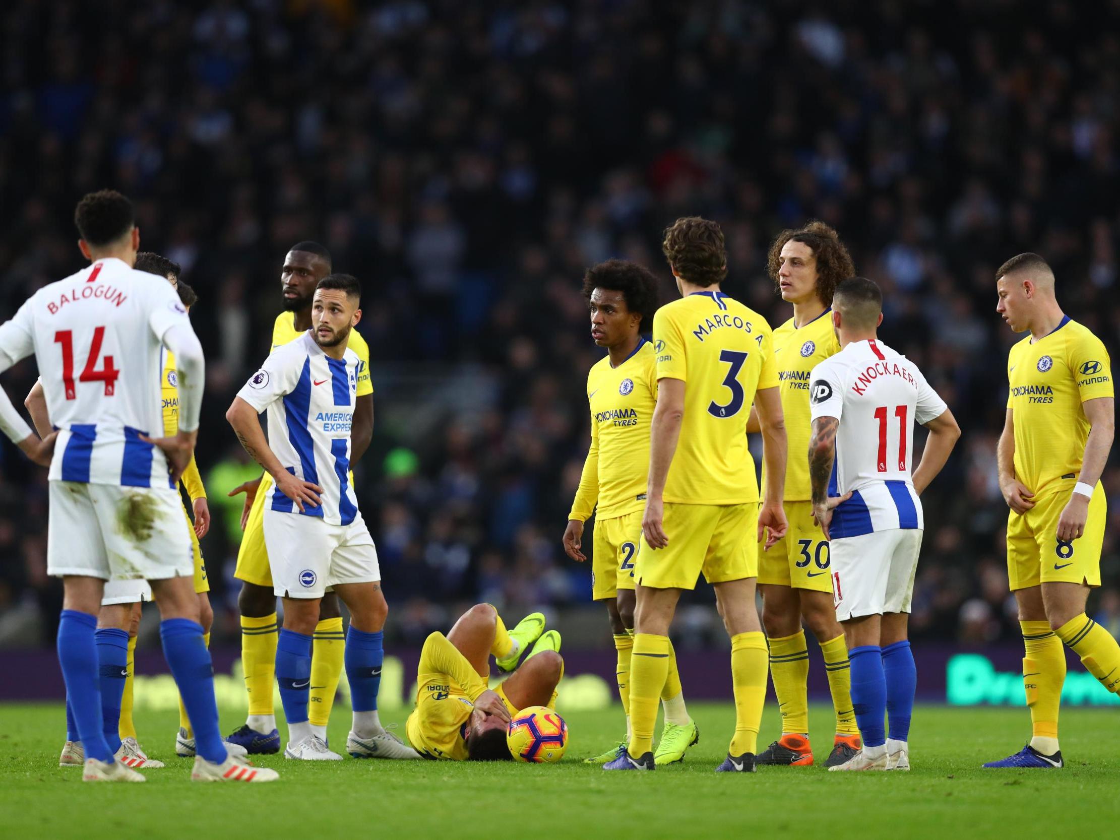 Hazard injured his ankle late on against Brighton and iced his foot on the bench