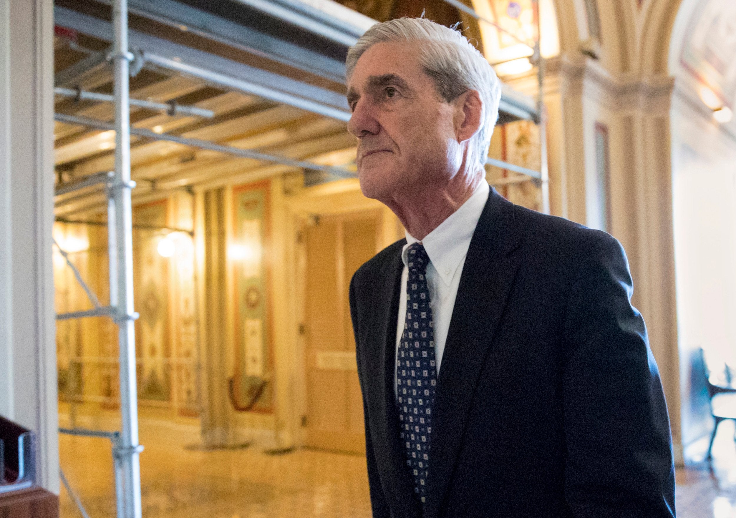 Robert Mueller departs after a meeting on Capitol Hill in Washington in June