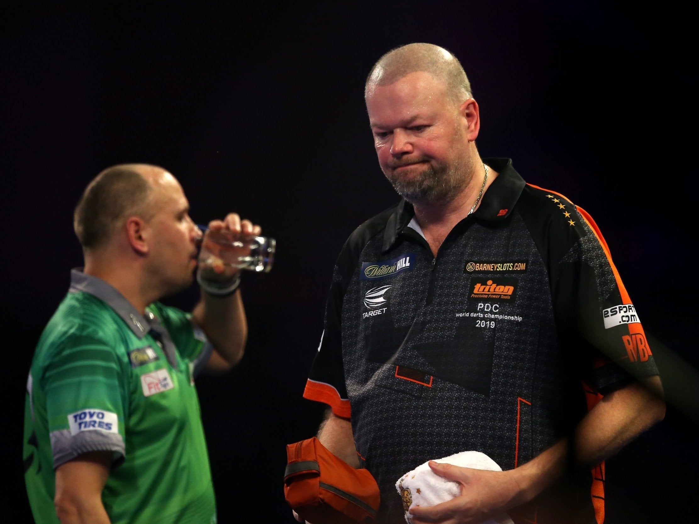 Raymond van Barneveld was knocked out of the World Darts Championship by Darius Labanauskas