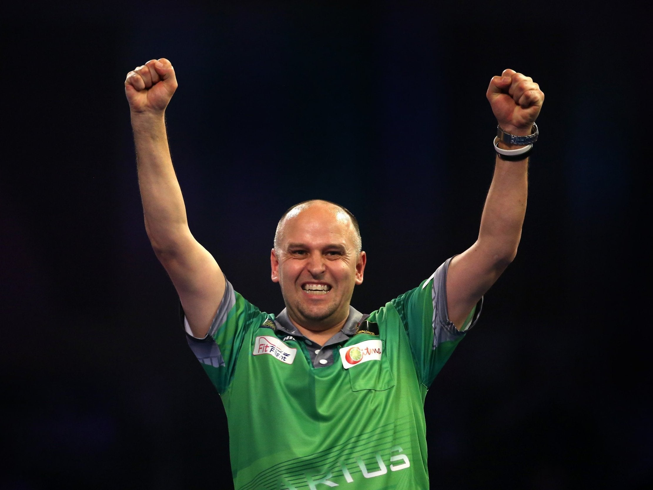 Darius Labanauskas celebrates victory over Raymond van Barneveld