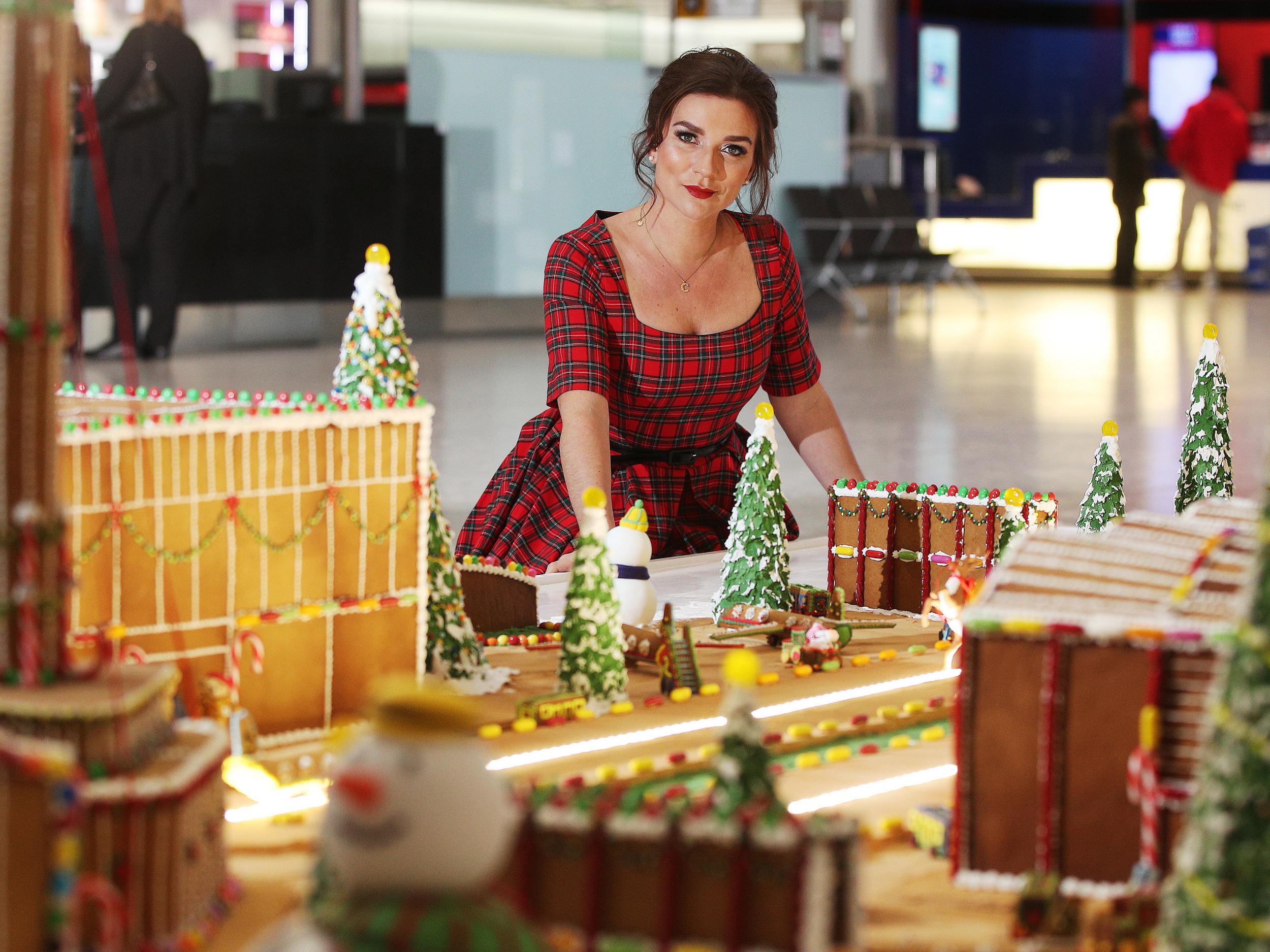 Great British Bake Off 2016 winner Candice Brown and food artist Michele Wibowo have unveiled a 50kg gingerbread model of Heathrow