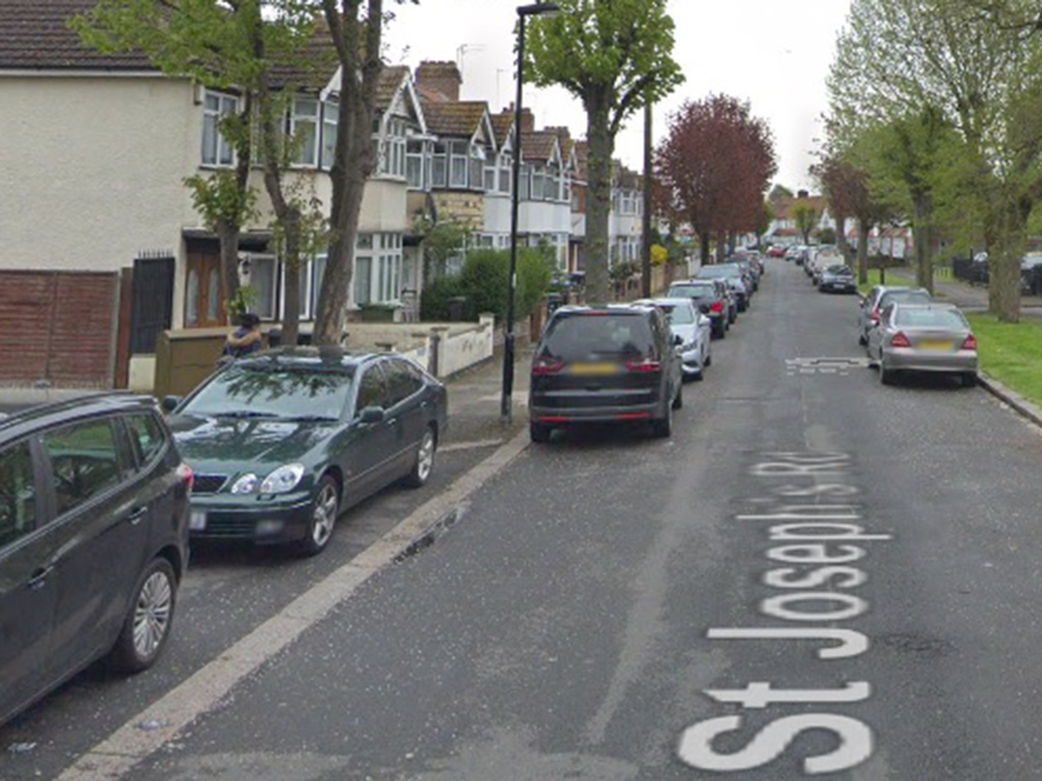 The victim died on St Joseph's Road in Enfield, shortly after officers arrived at the scene.