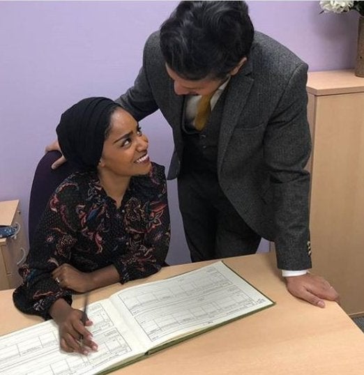 Nadiya Hussain and her husband Abdal signing a wedding certificate