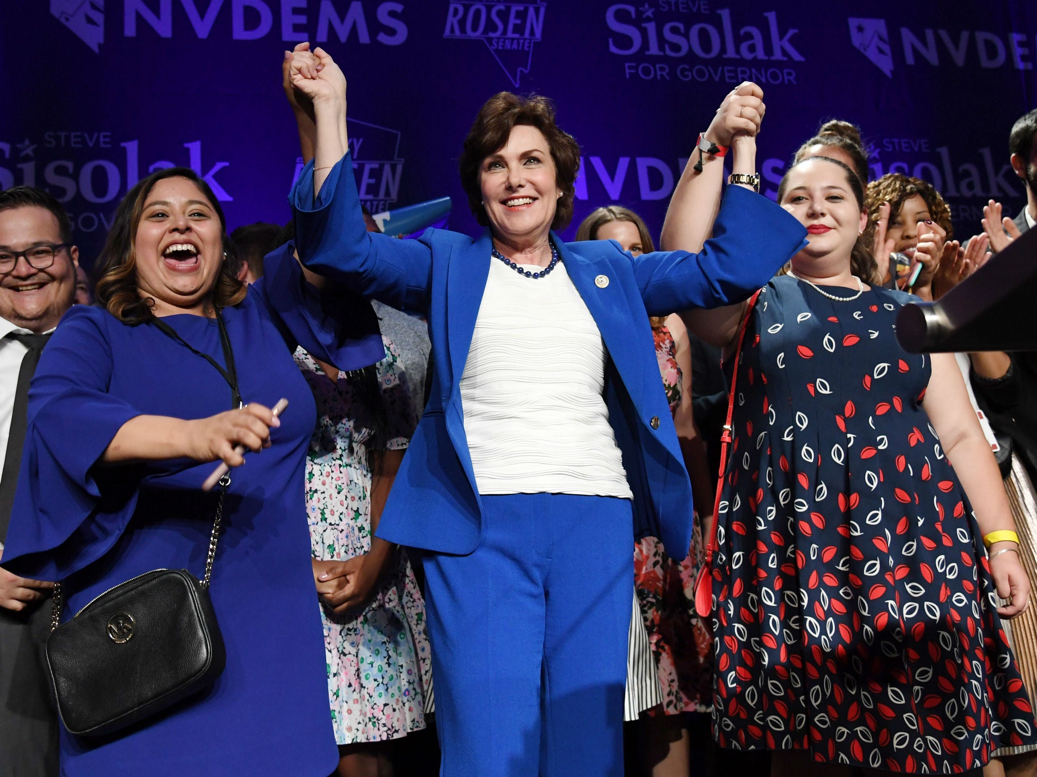 Jacky Rosen celebrates with members of her team after winning her US Senate race against Dean Heller in November