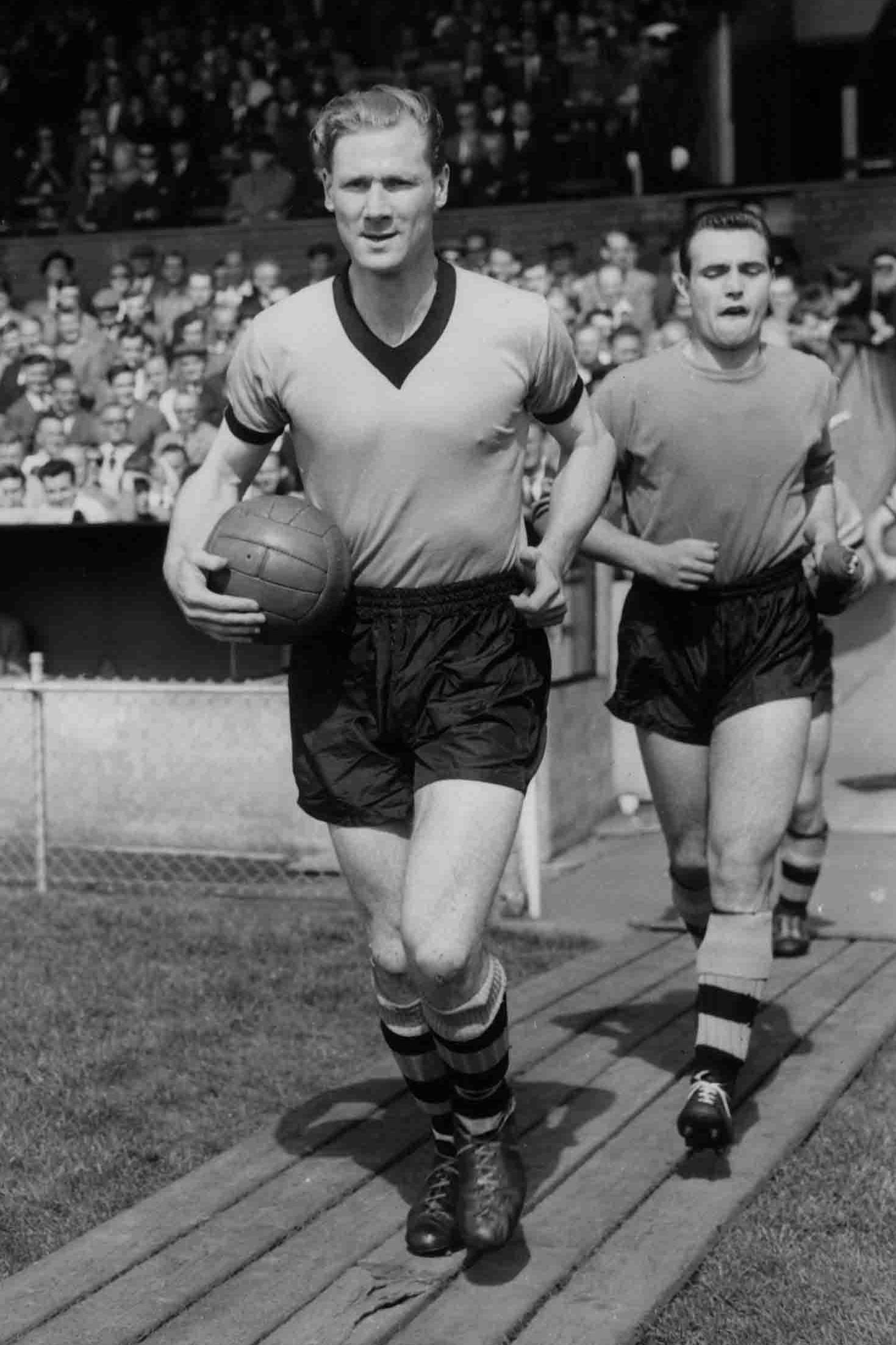 Running out as captain for Wolves in 1960