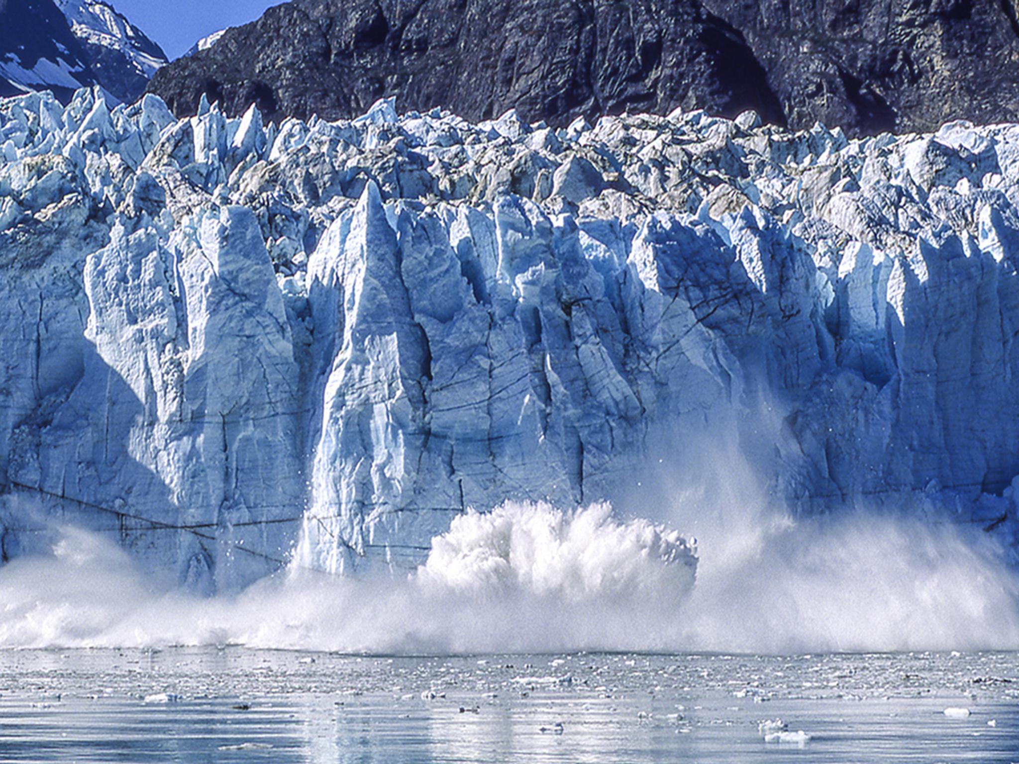 Vanishing act: ice blocks crash into the sea on the Alaskan coast