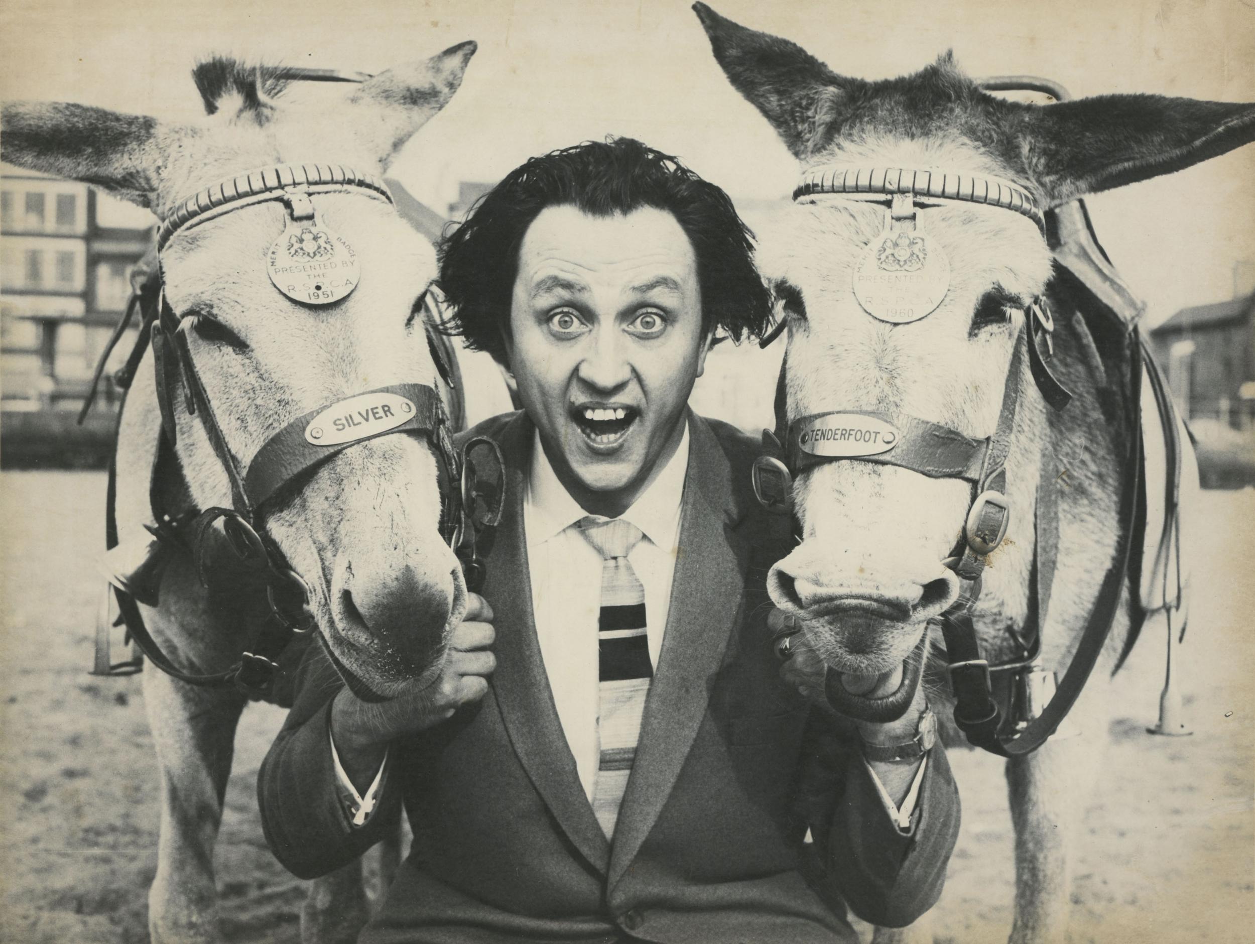 Buck-toothed, crazy-haired comedian Ken Dodd