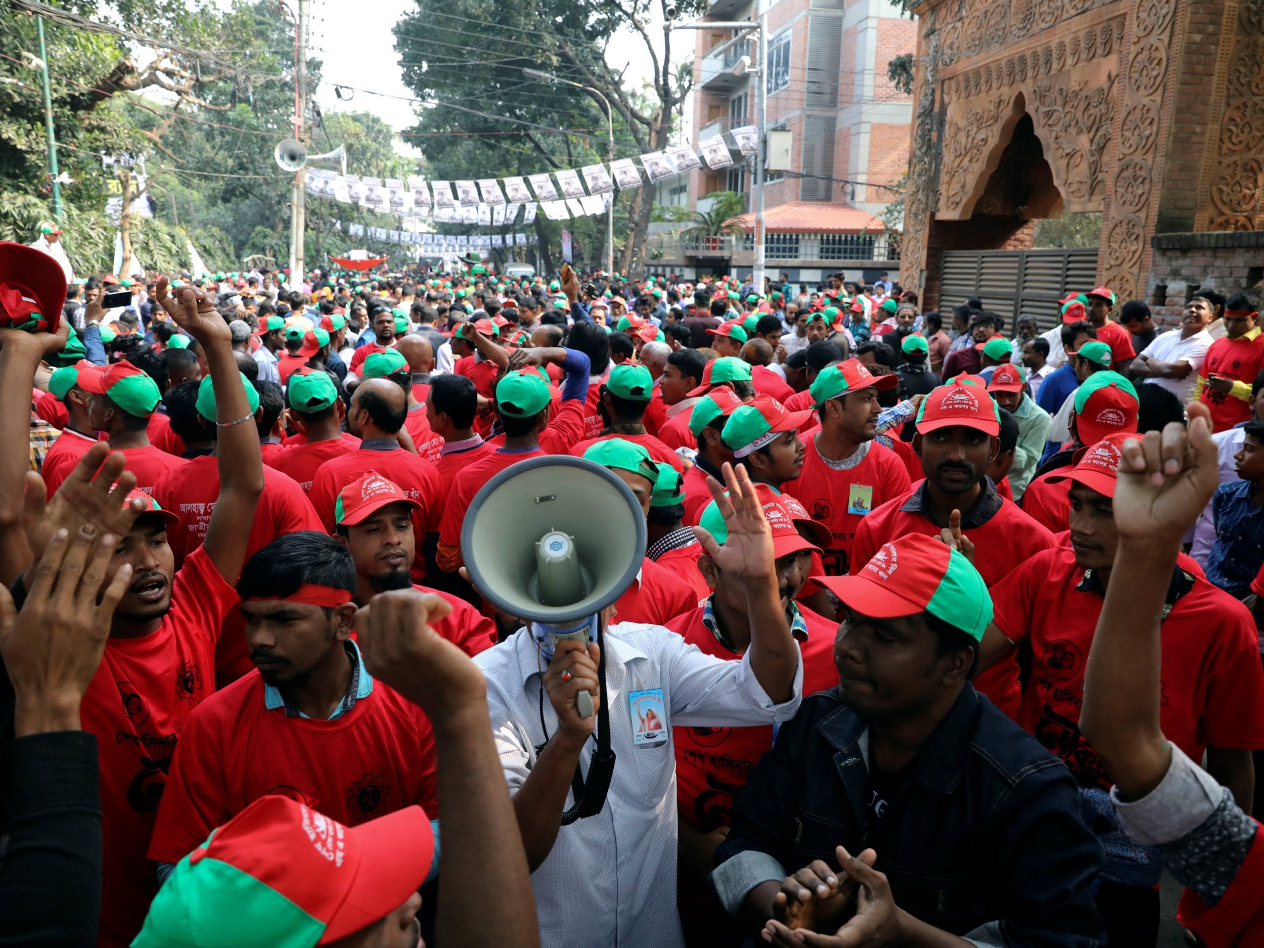 Supporters of the ruling party Bangladesh Awami League campaign in Dhaka on Friday