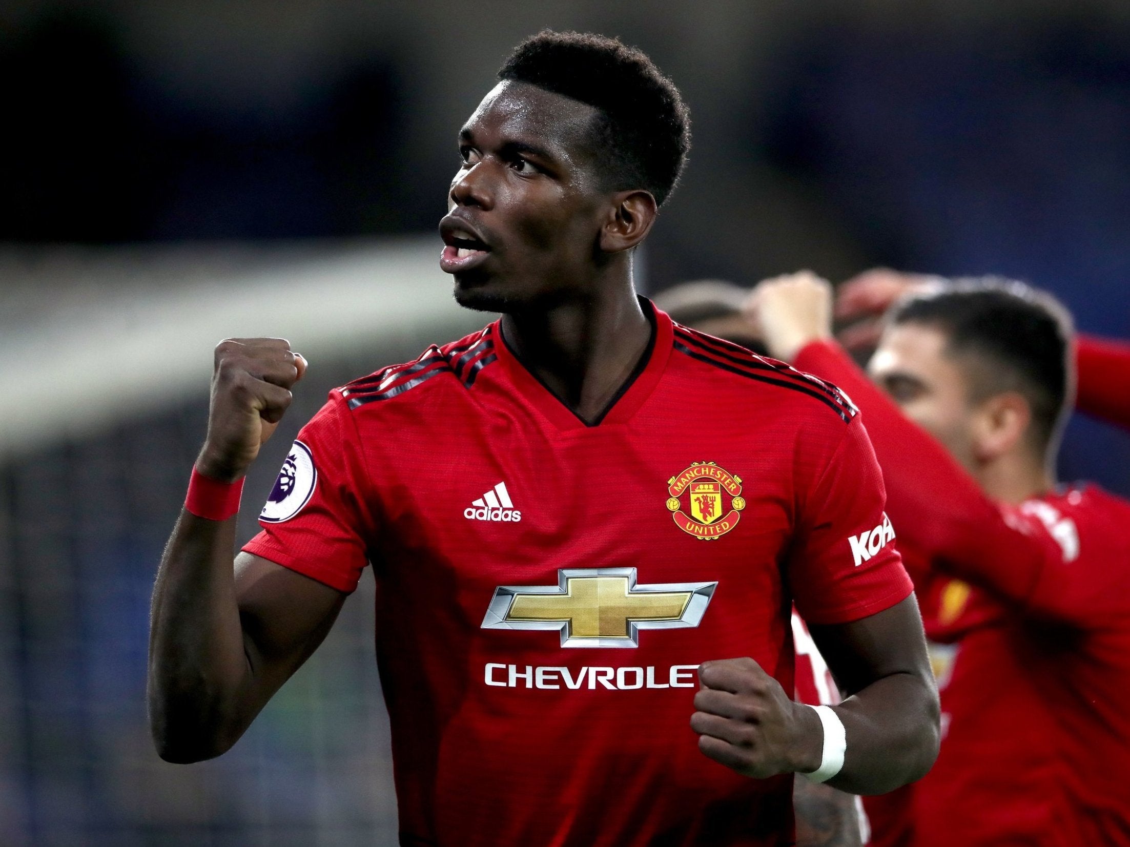 Paul Pogba celebrates during the emphatic win at Cardiff