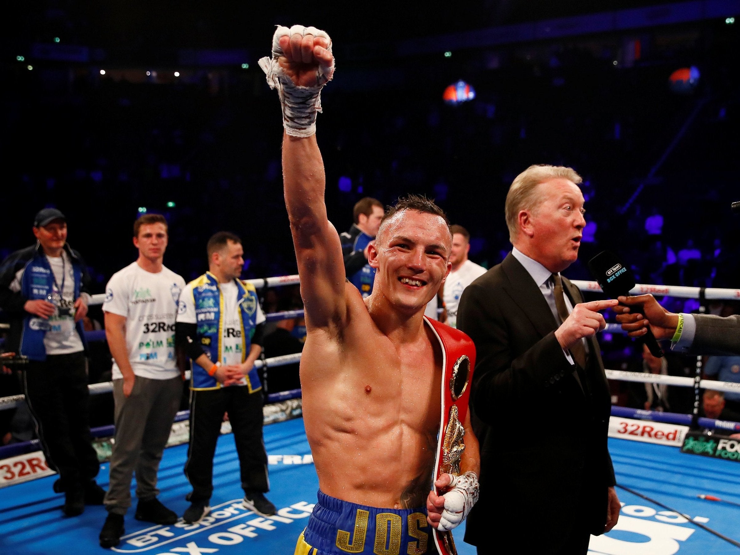 Josh Warrington celebrates his win over Carl Frampton next to promoter Frank Warren (Action Images via Reuters)