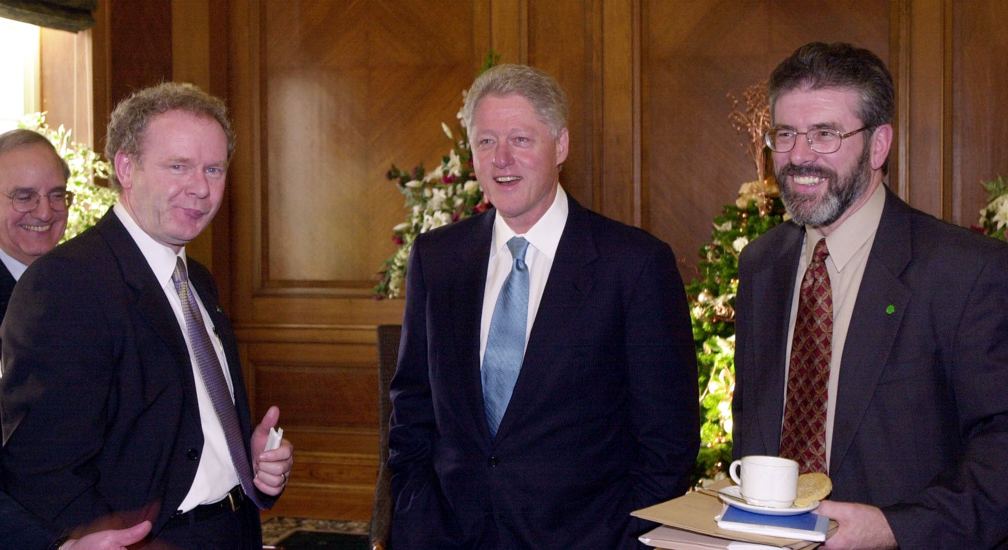 Bill Clinton with Sinn Fein’s Martin McGuinness (left) and Gerry Adams during a presidential visit to Belfast in 2000 ( PA)