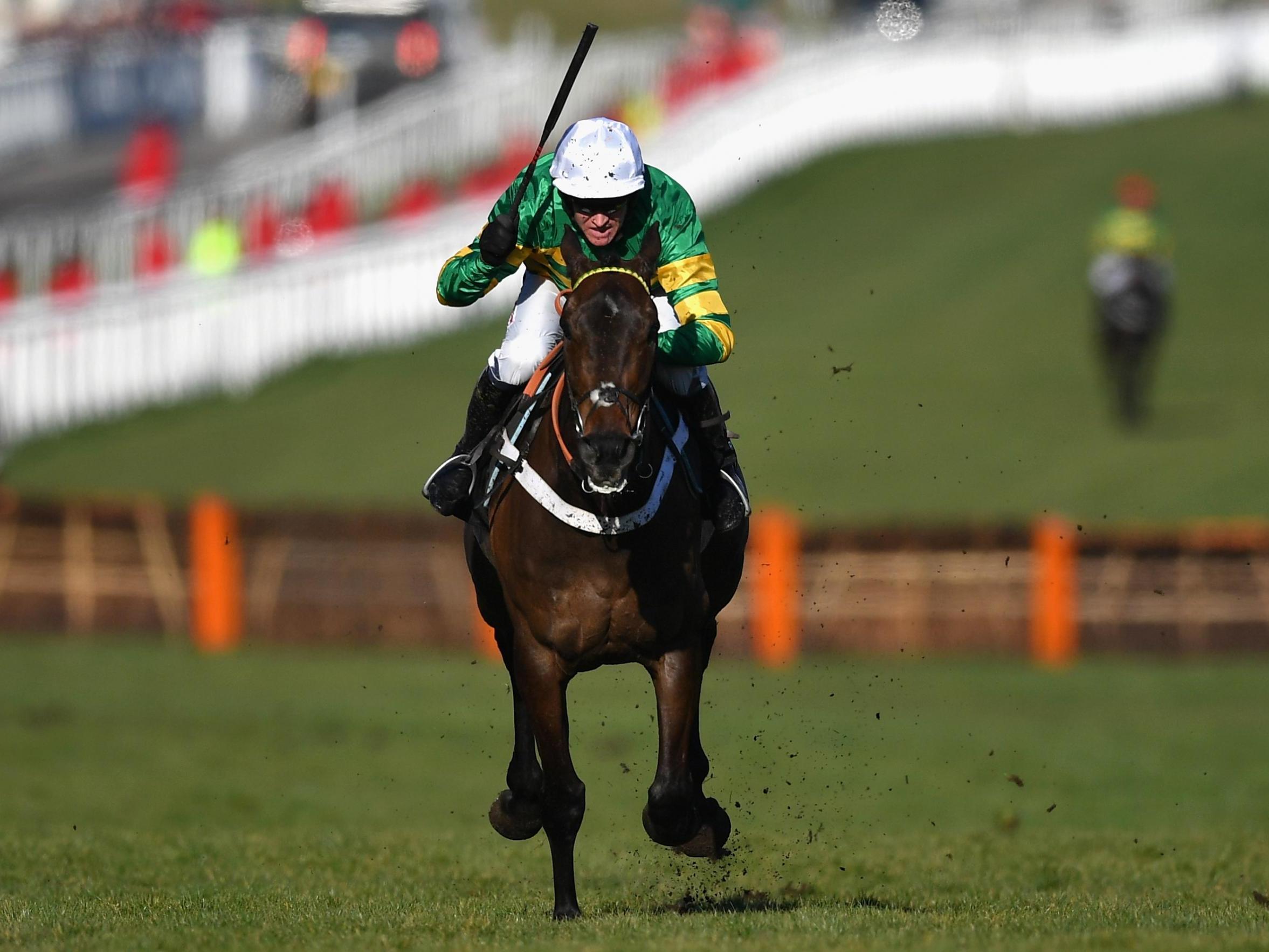 Buveur D'Air ridden by B J Geraghty on the way to victory during the Champion Hurdle Challenge Trophy at the Cheltenham Festival