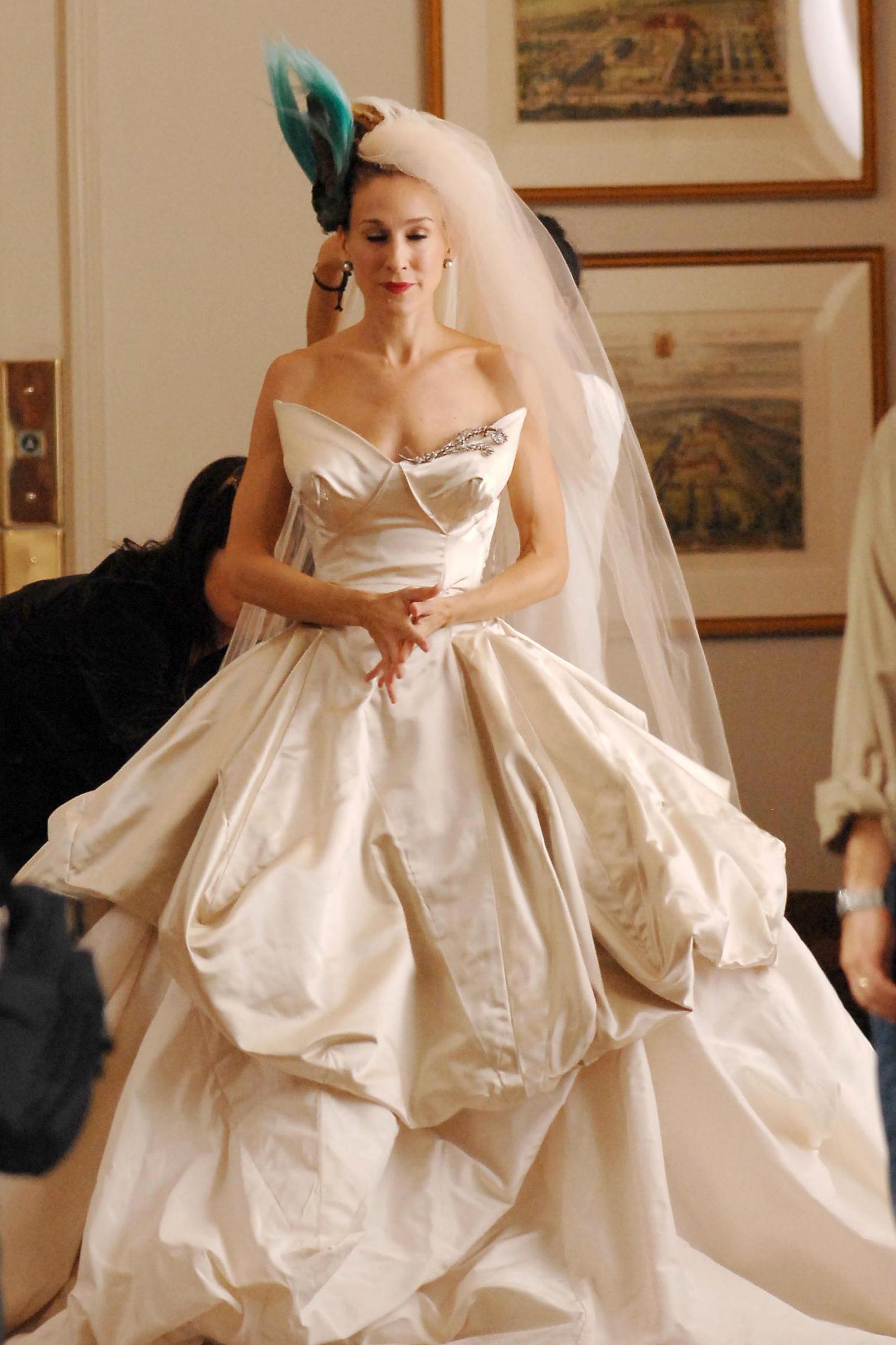 Sarah Jessica Parker in the iconic gown that might’ve inspired Cyrus’ choice of wedding dress designer