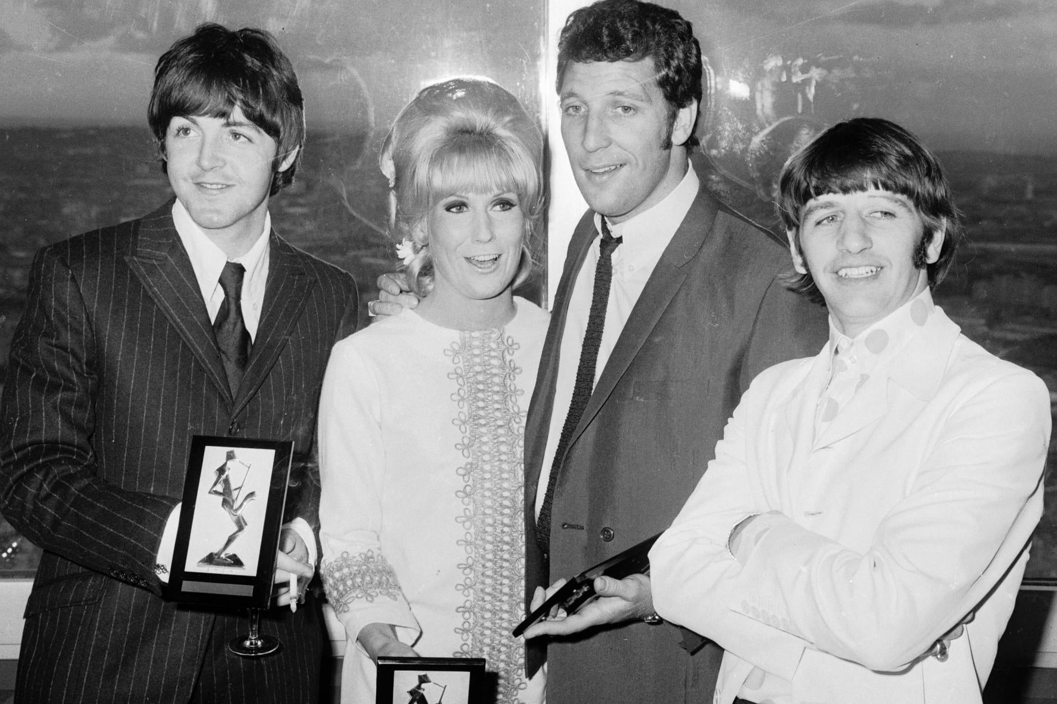 With Paul McCartney, Tom Jones and Ringo Starr in London’s Post Office Tower after the 1966 Melody Maker awards