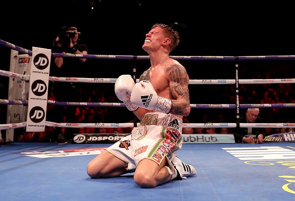 Charlie Edwards celebrates after the final bell rings in the 12th round