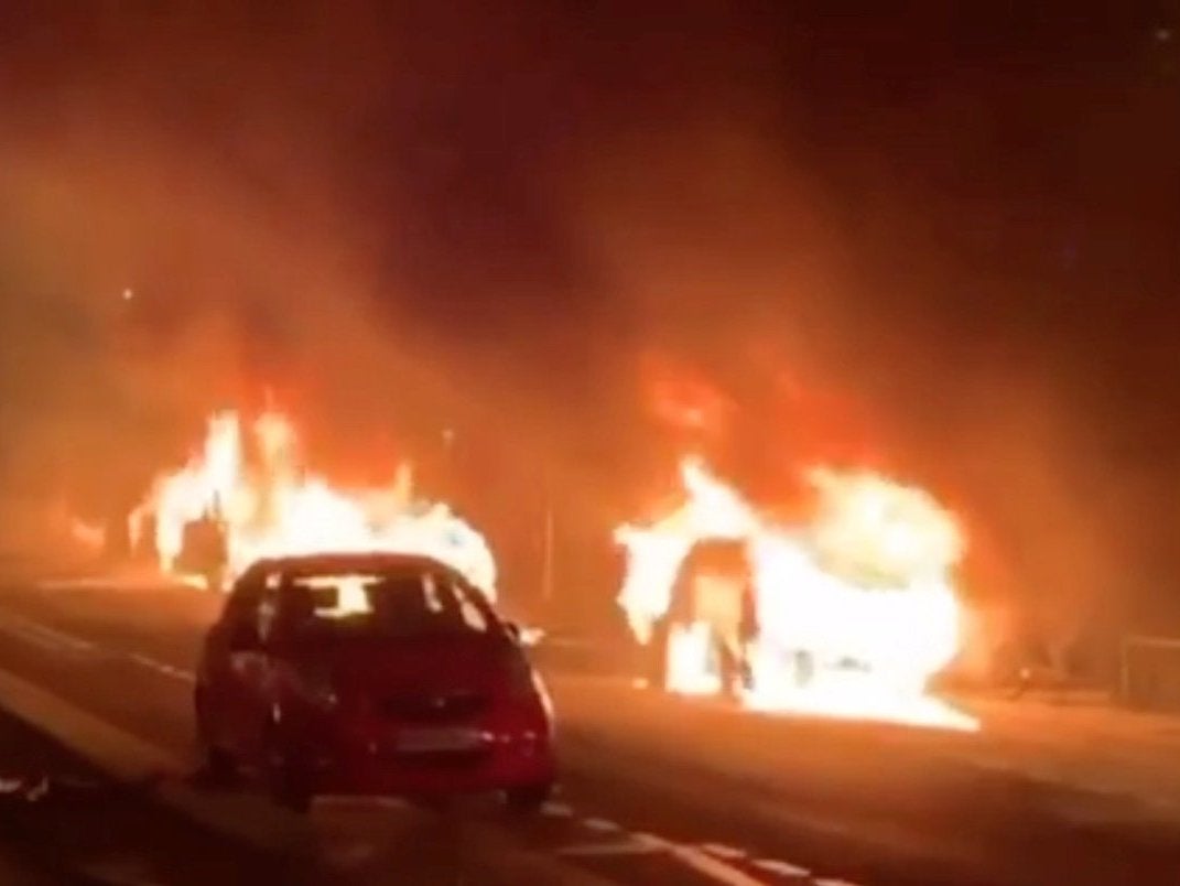 Cars are set on fire during a protest by the 'yellow vests' movement in Paris, France, 29 December