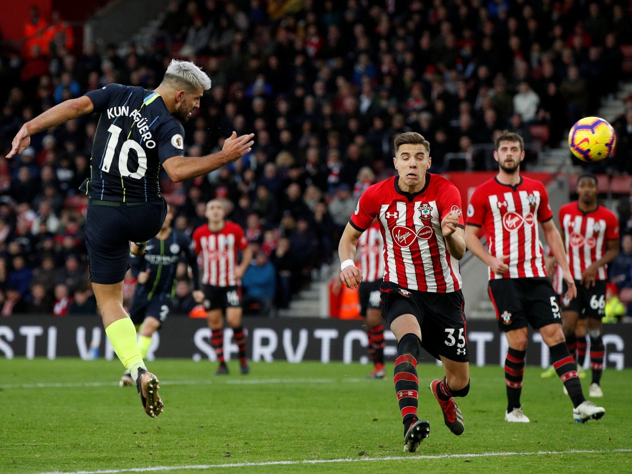 Manchester City's Sergio Aguero scores their third goal