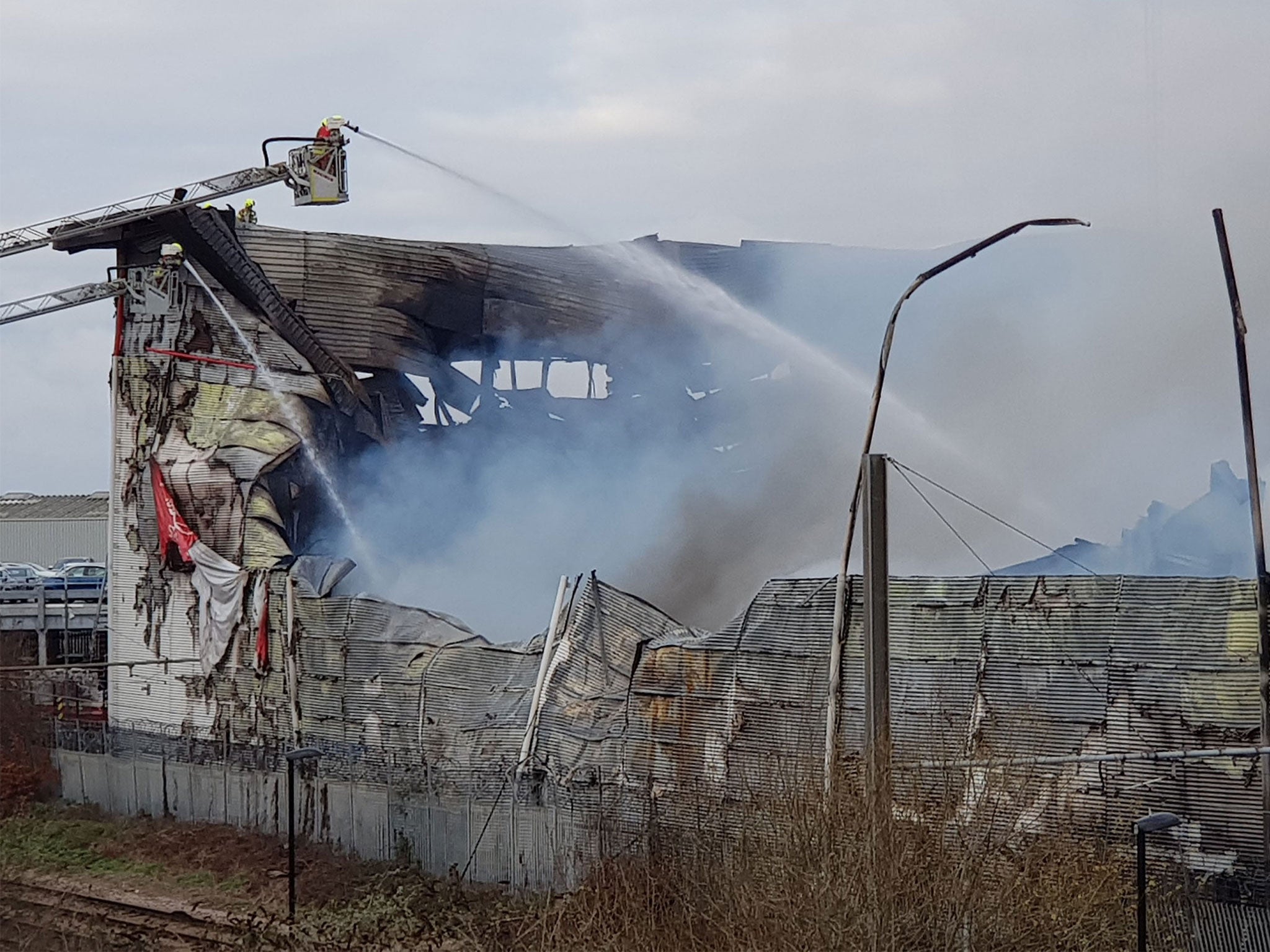 Firefighters were expected to continue fighting the blaze at a warehouse in Croydon into Tuesday evening