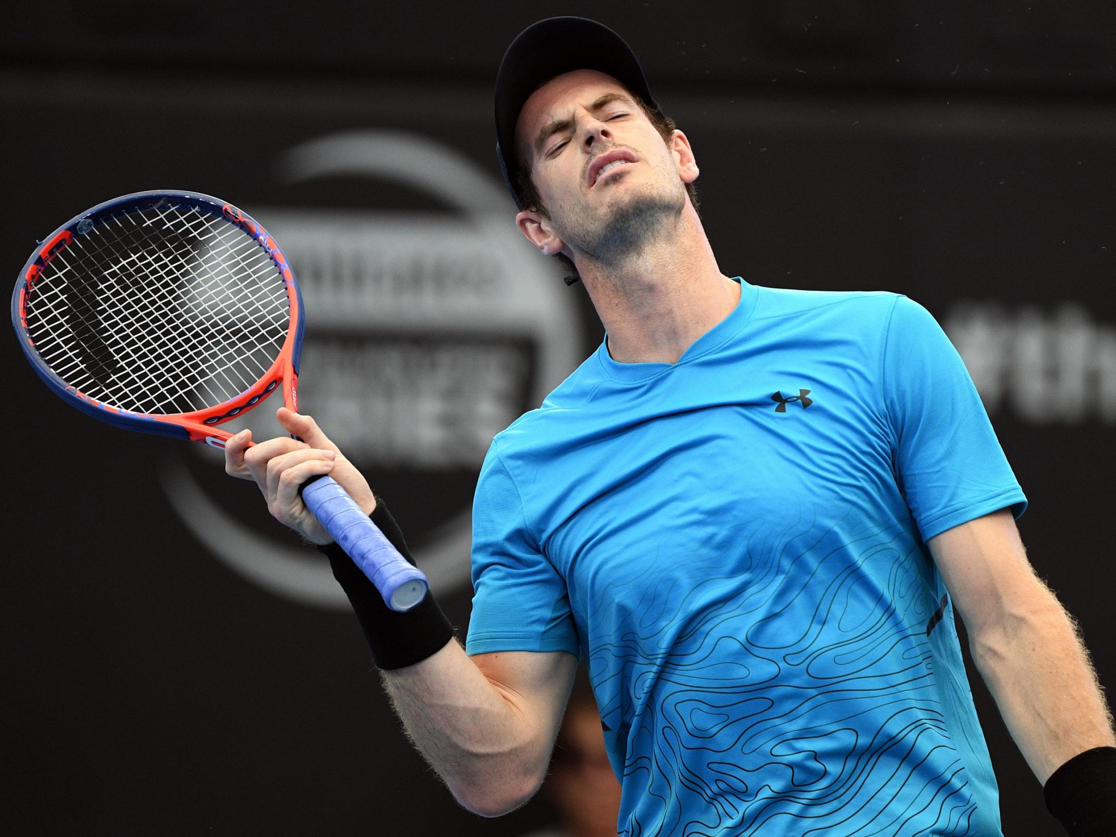 Murray reacts after losing a game against the Russian youngster