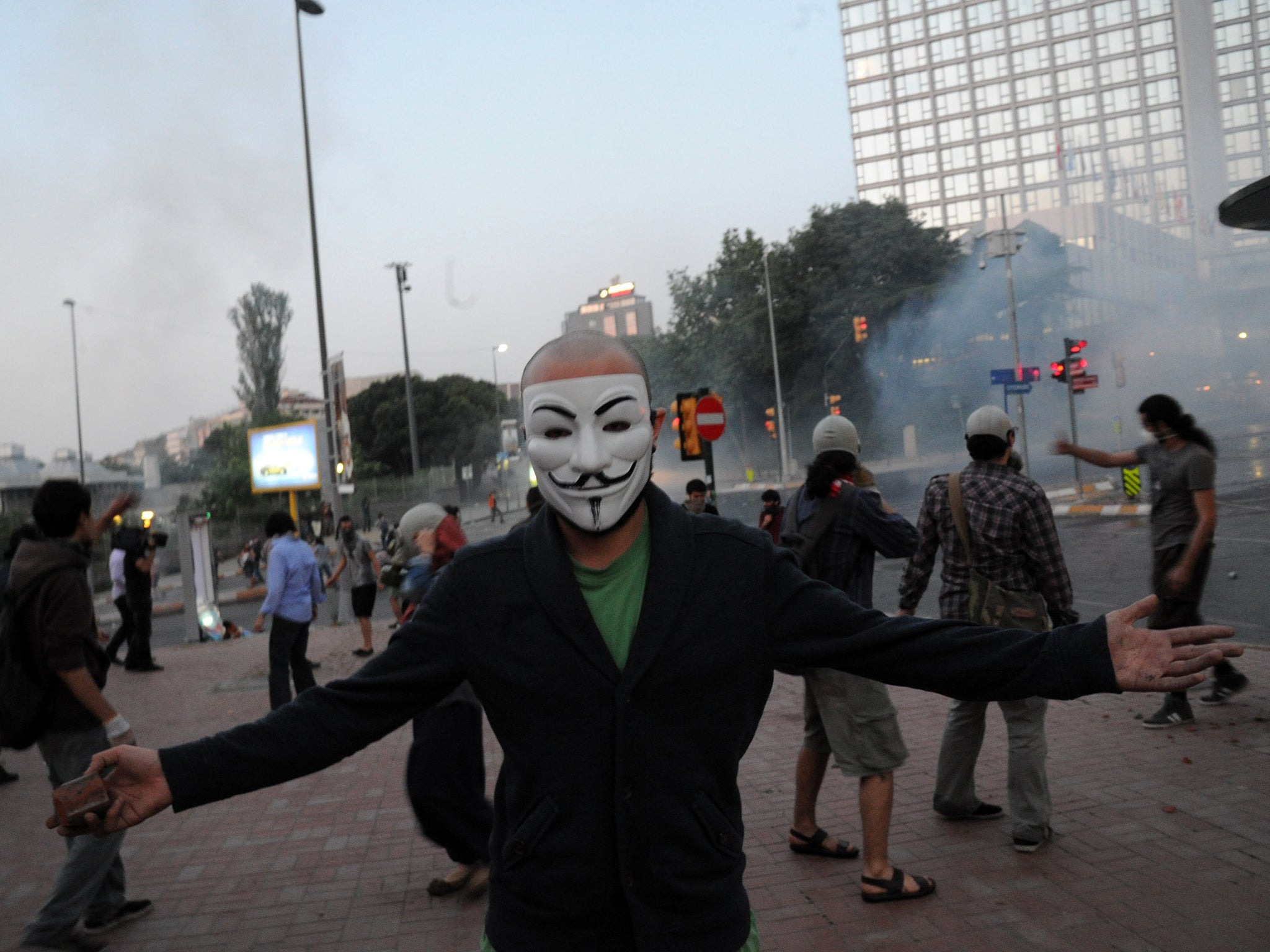 Protestors clash with riot police during a protest against the demolition of Taksim Gezi Park on 31 May 2013 (AFP/Getty)